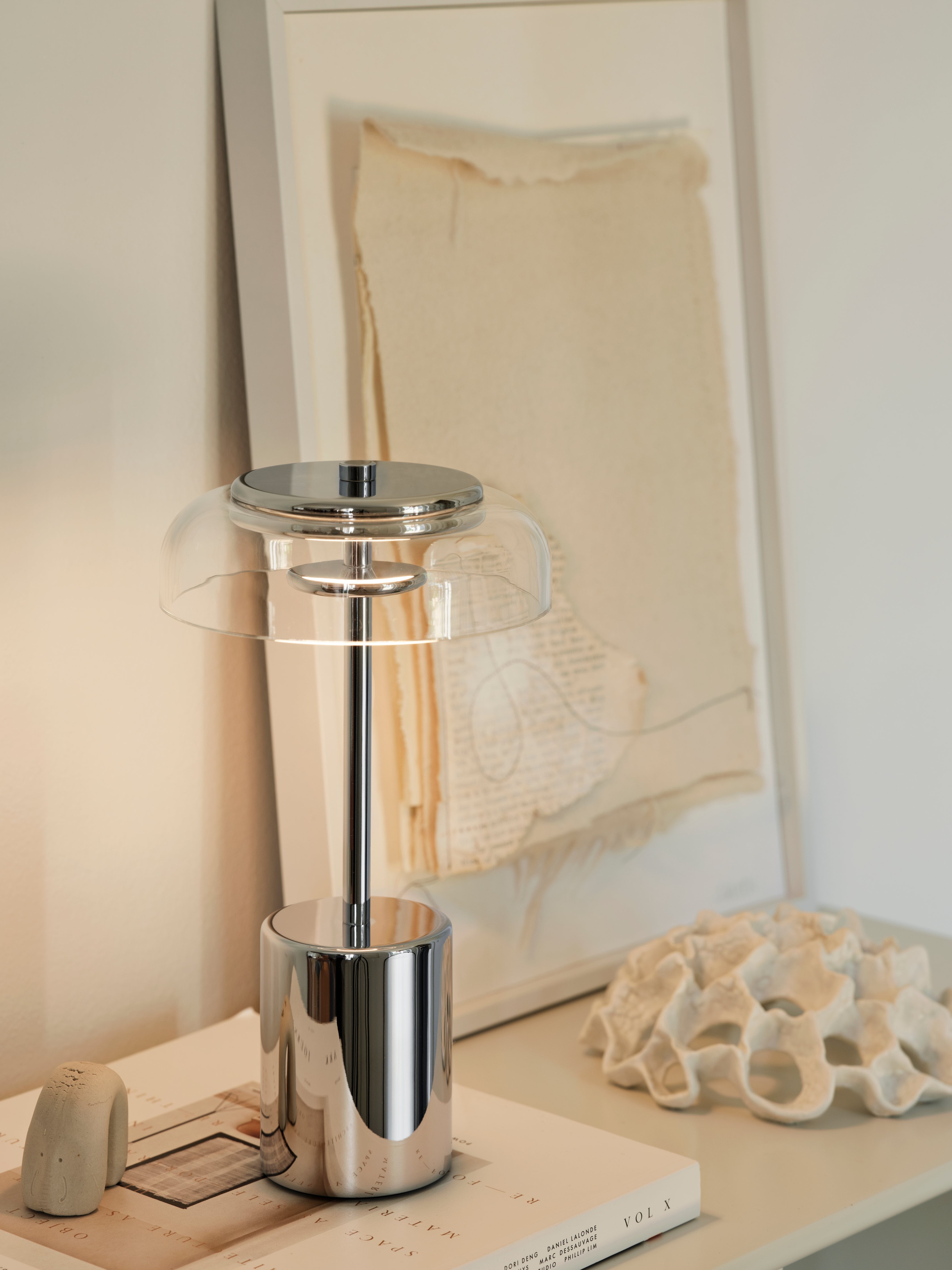 Lampa przenośna BLOSSI srebrny z transparentnym szkłem, marka Nuura