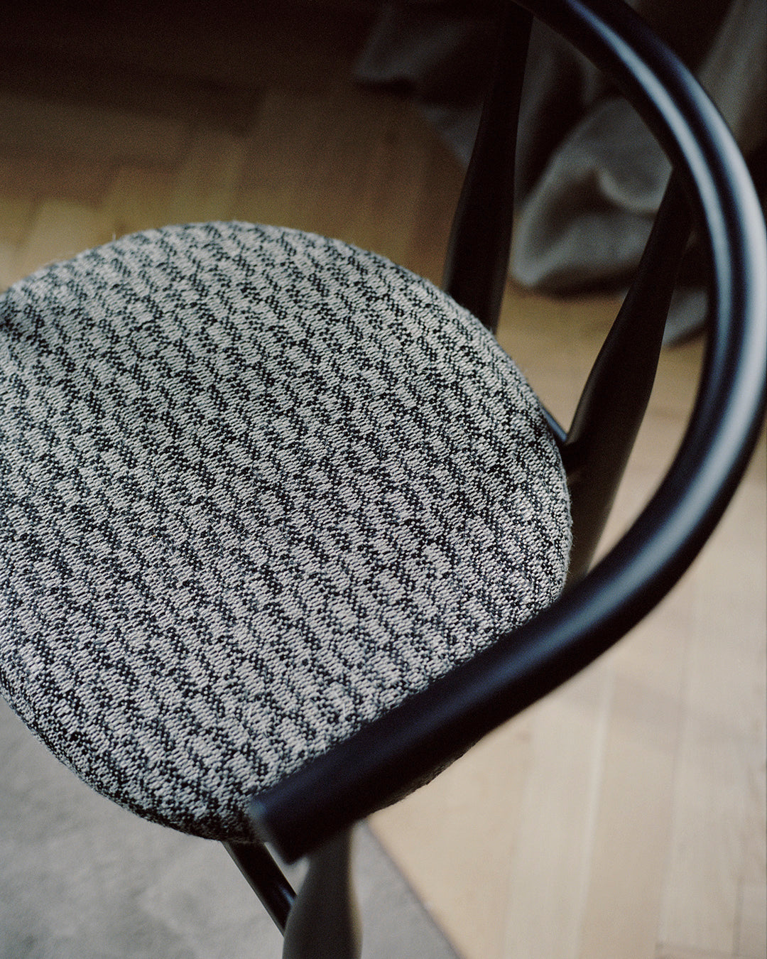 Bukowski chair upholstered with a black beech base
