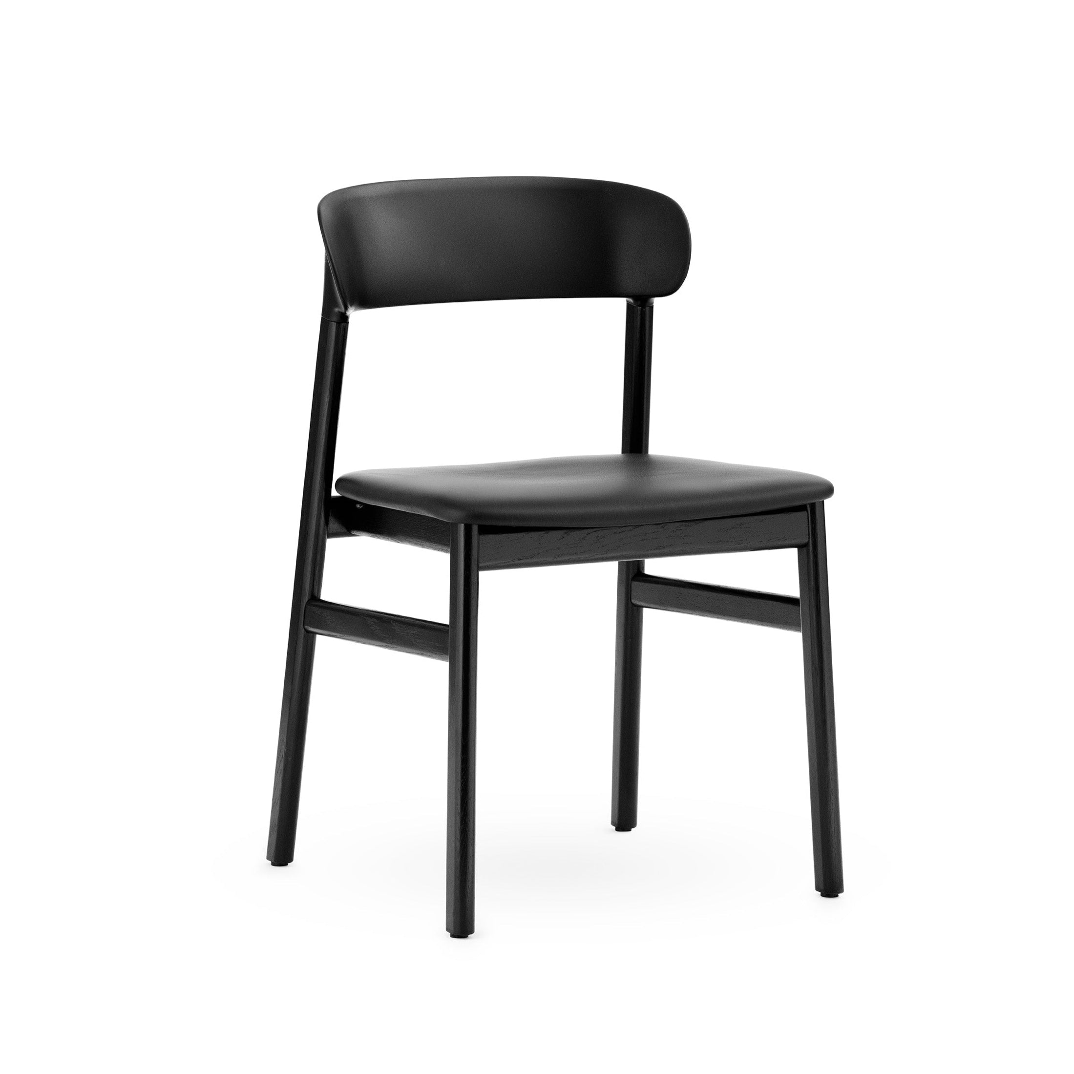 Herit upholstered chair with a black oak base