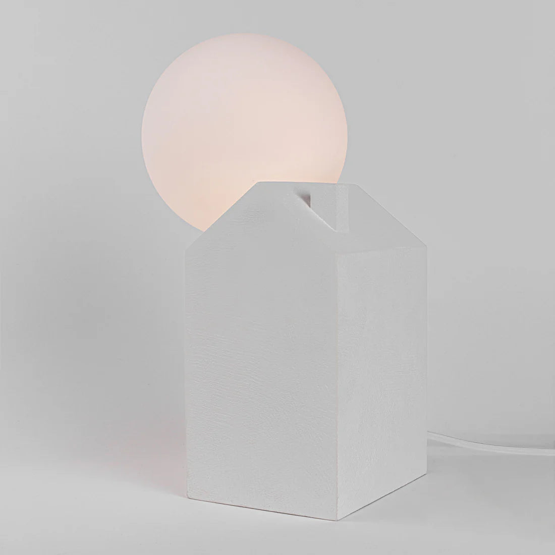 Dreamlike table lamp white concrete