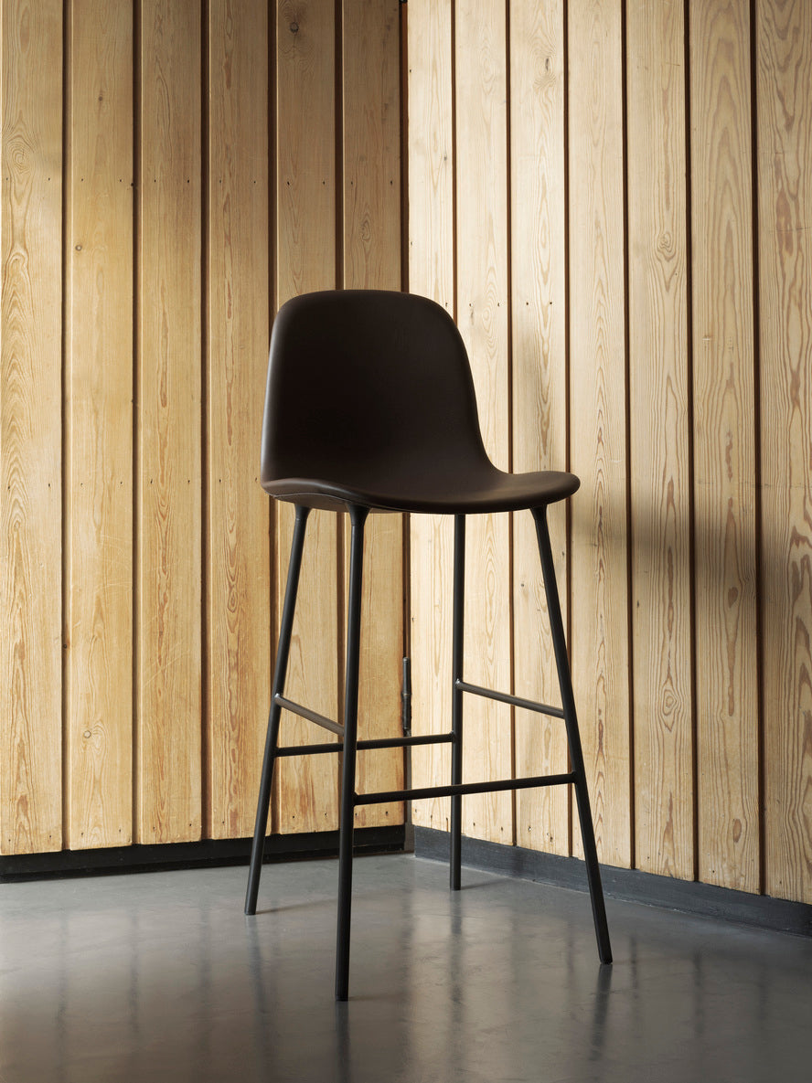 Bar chair upholstered forms with a burgundy base