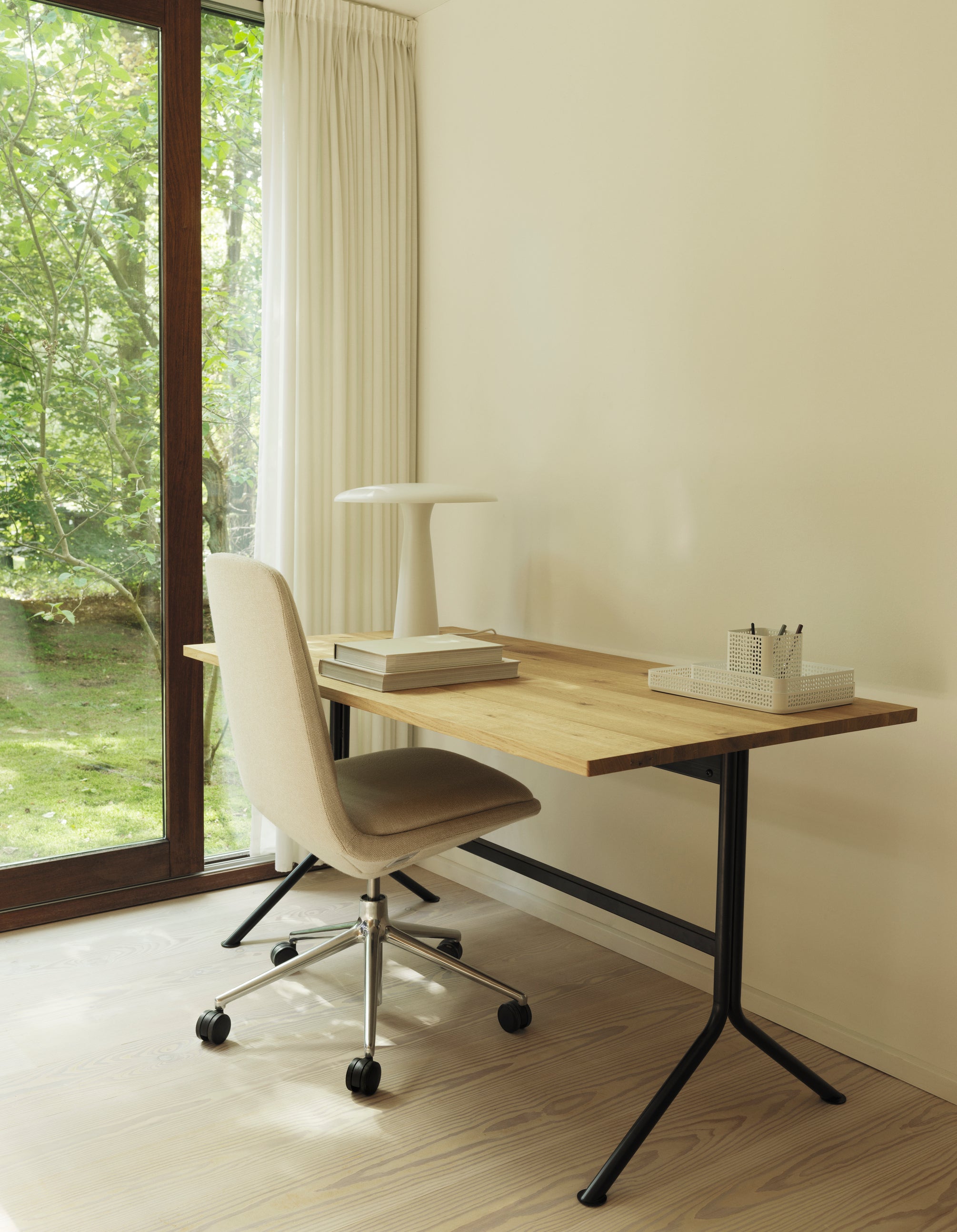 Kip desk, a natural pine with a black base