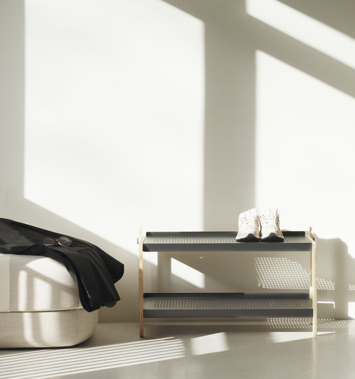 SKO gray shoes stand