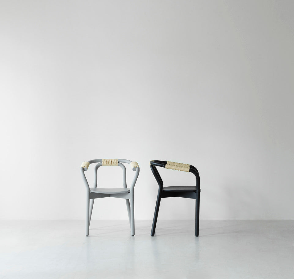 Black wick chair with a natural string