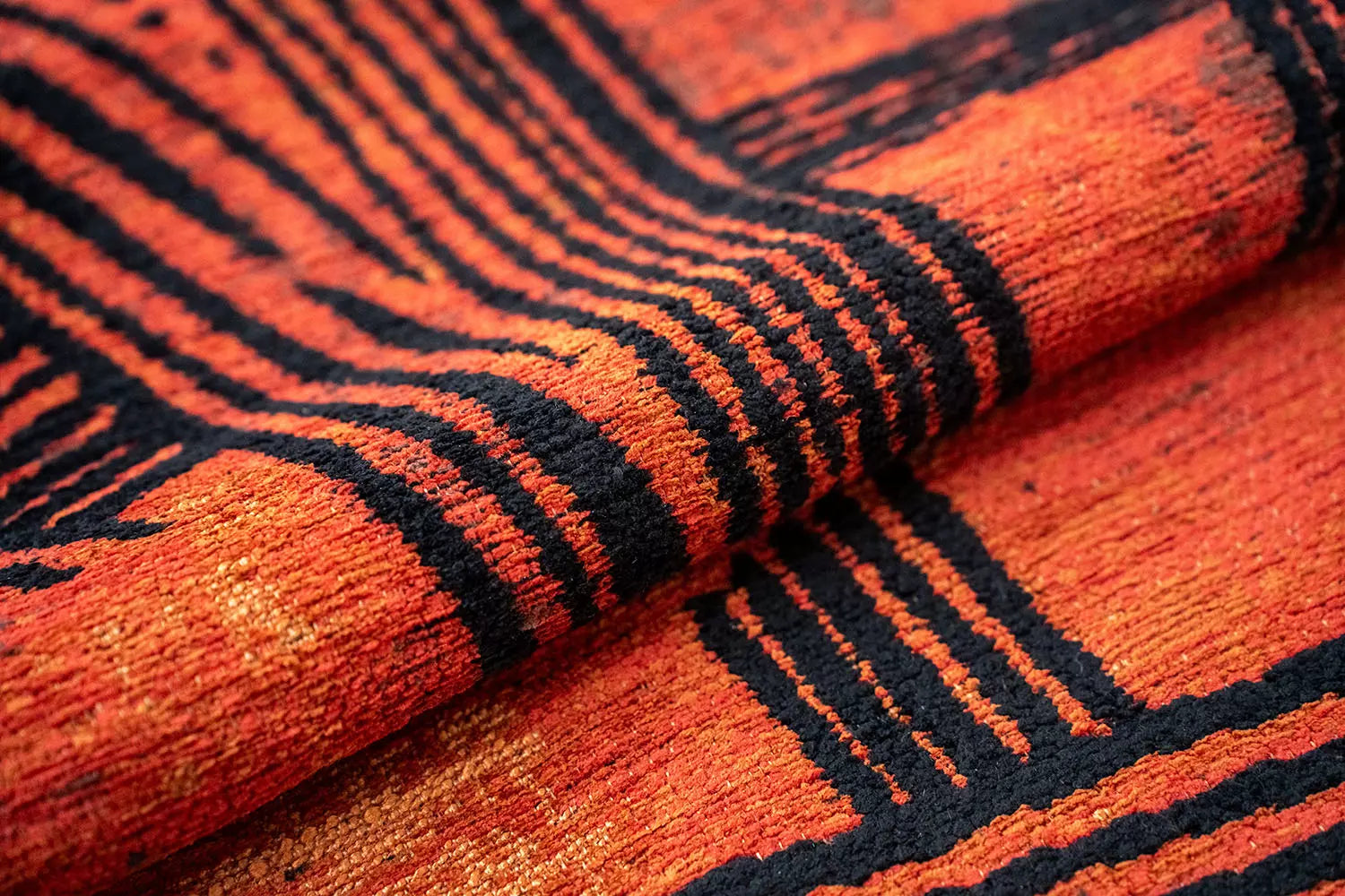 Runder Teppich KANJI orange mit schwarz