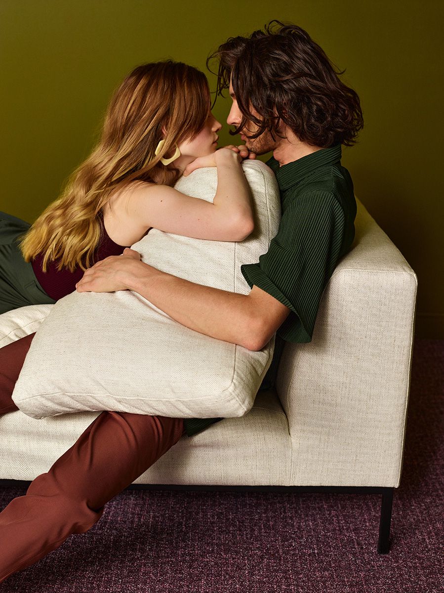 HOLDEN upholstered pouf with black base