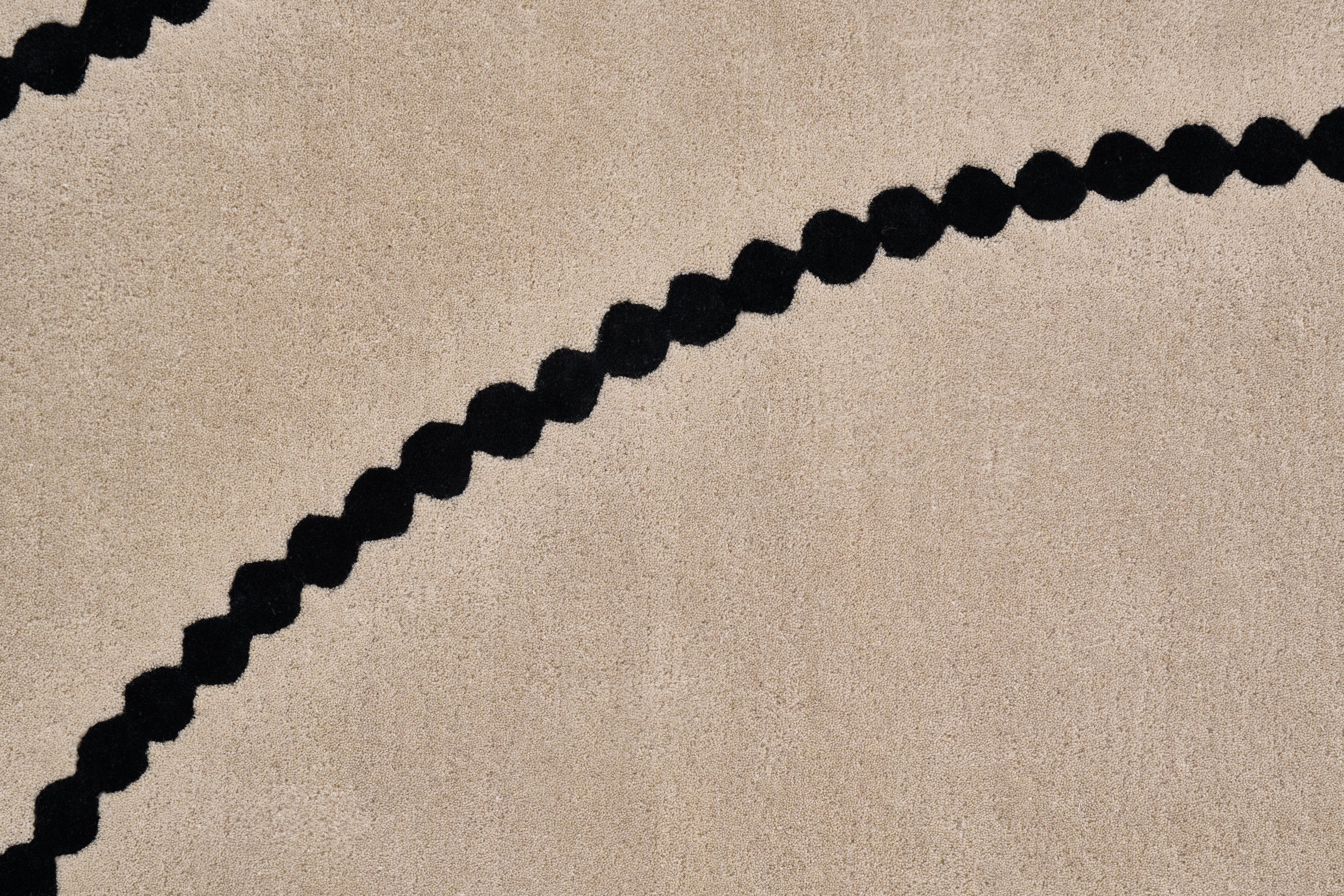 Teppich LUNA beige mit schwarzem Muster