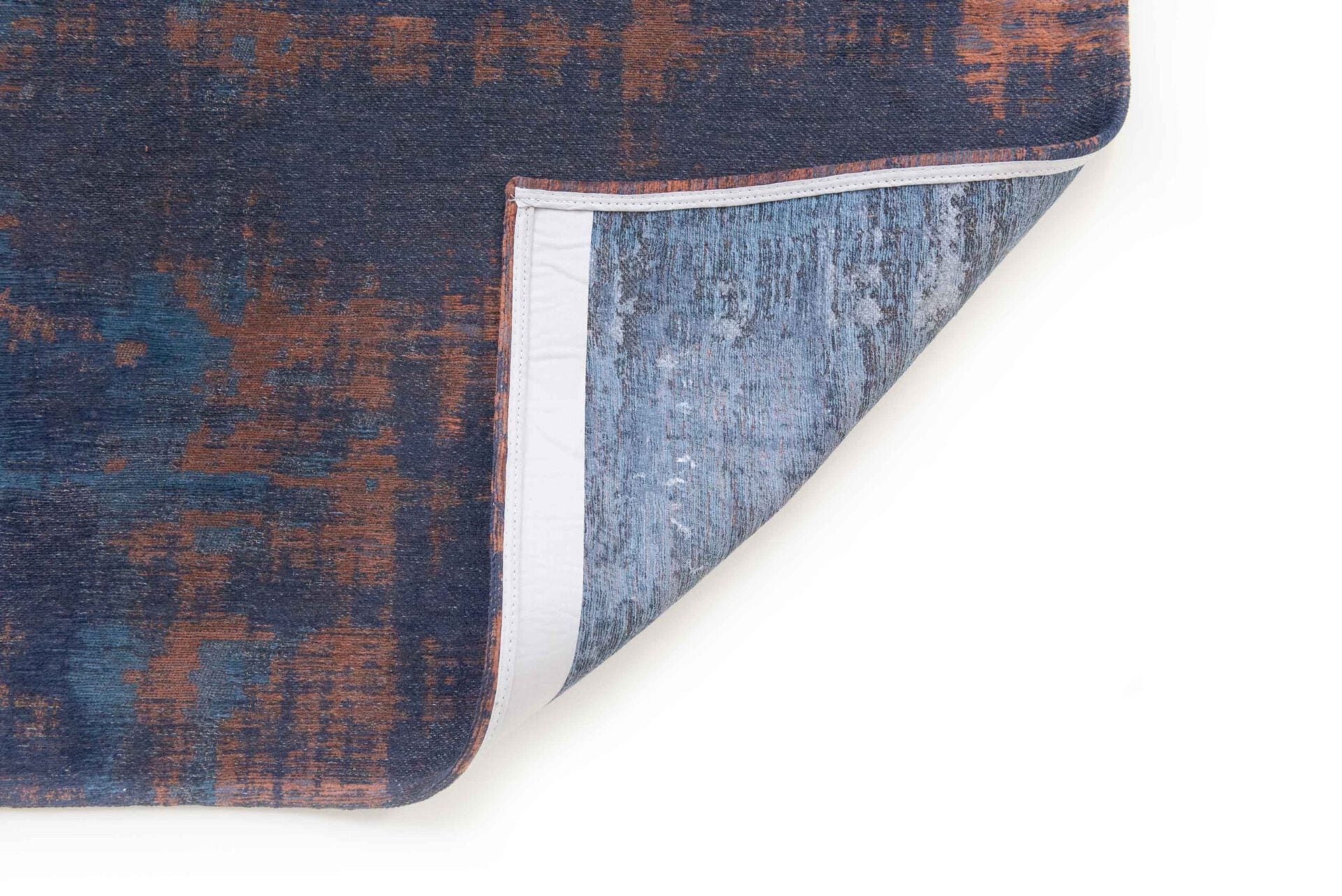 Dywan VENETIAN DUST SUNSET BLUE granatowo-miedziany – Louis de Poortere
