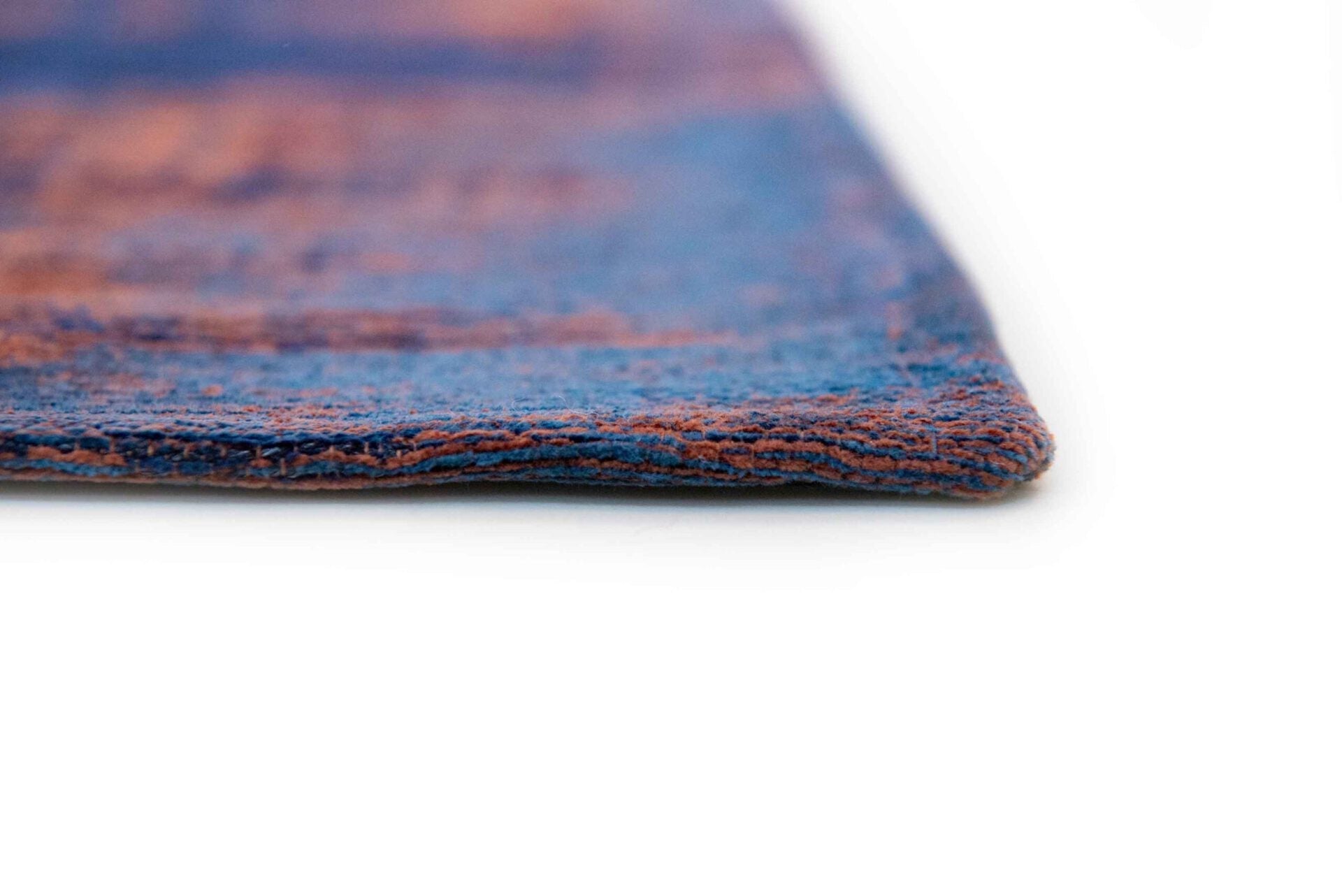 Dywan VENETIAN DUST SUNSET BLUE granatowo-miedziany – Louis de Poortere
