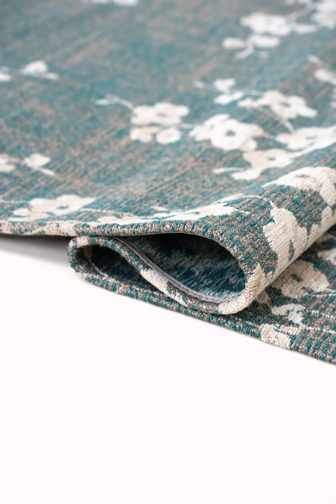 Ovaler Teppich SAKURA blau mit Weiß