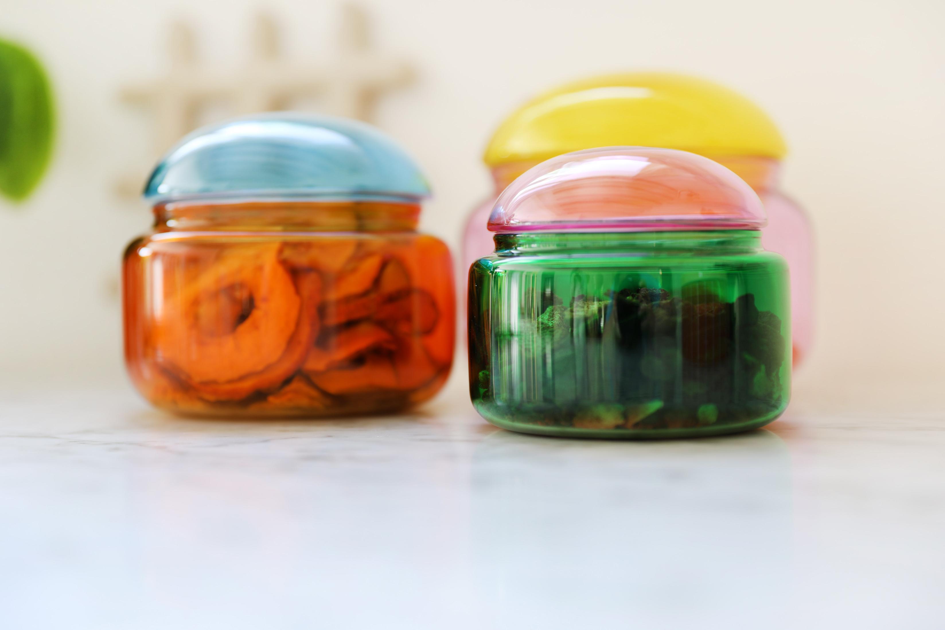 Glasbehälter PUFFY grün mit rosa Deckel