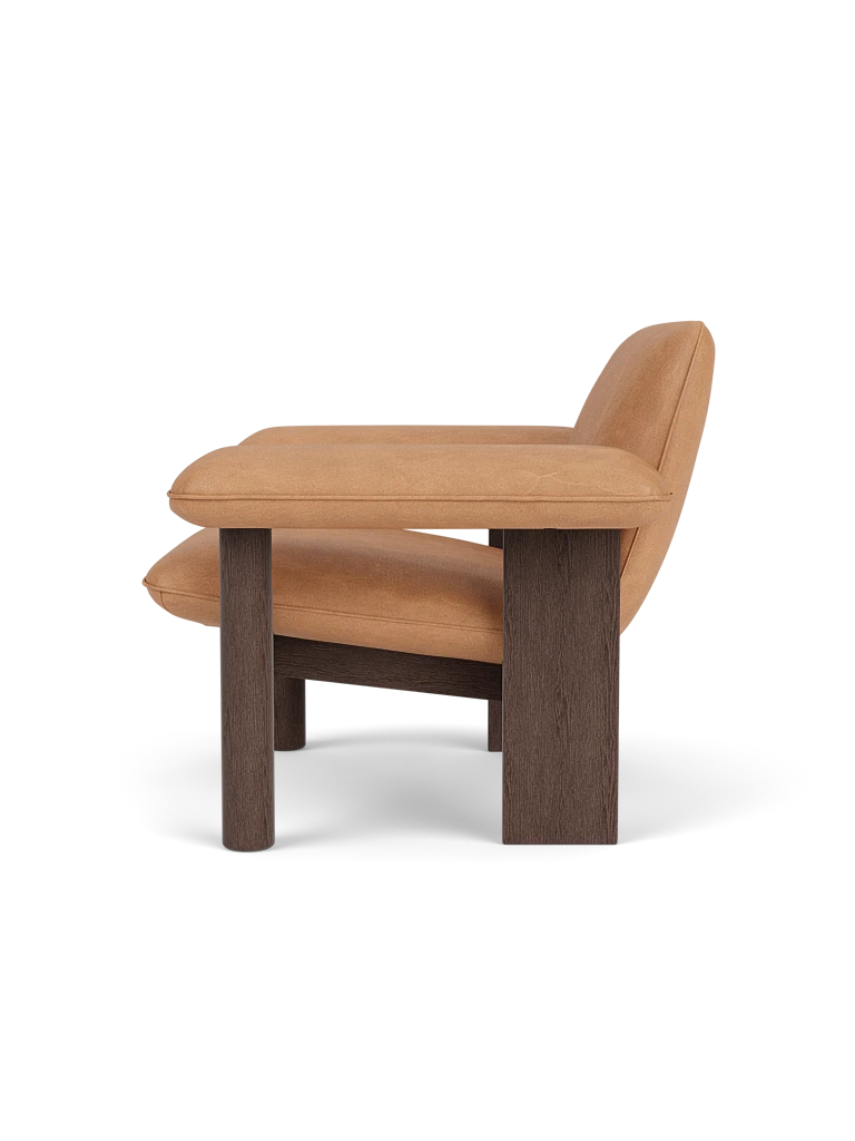 BRASILIA armchair in cognac leather with a dark oak base