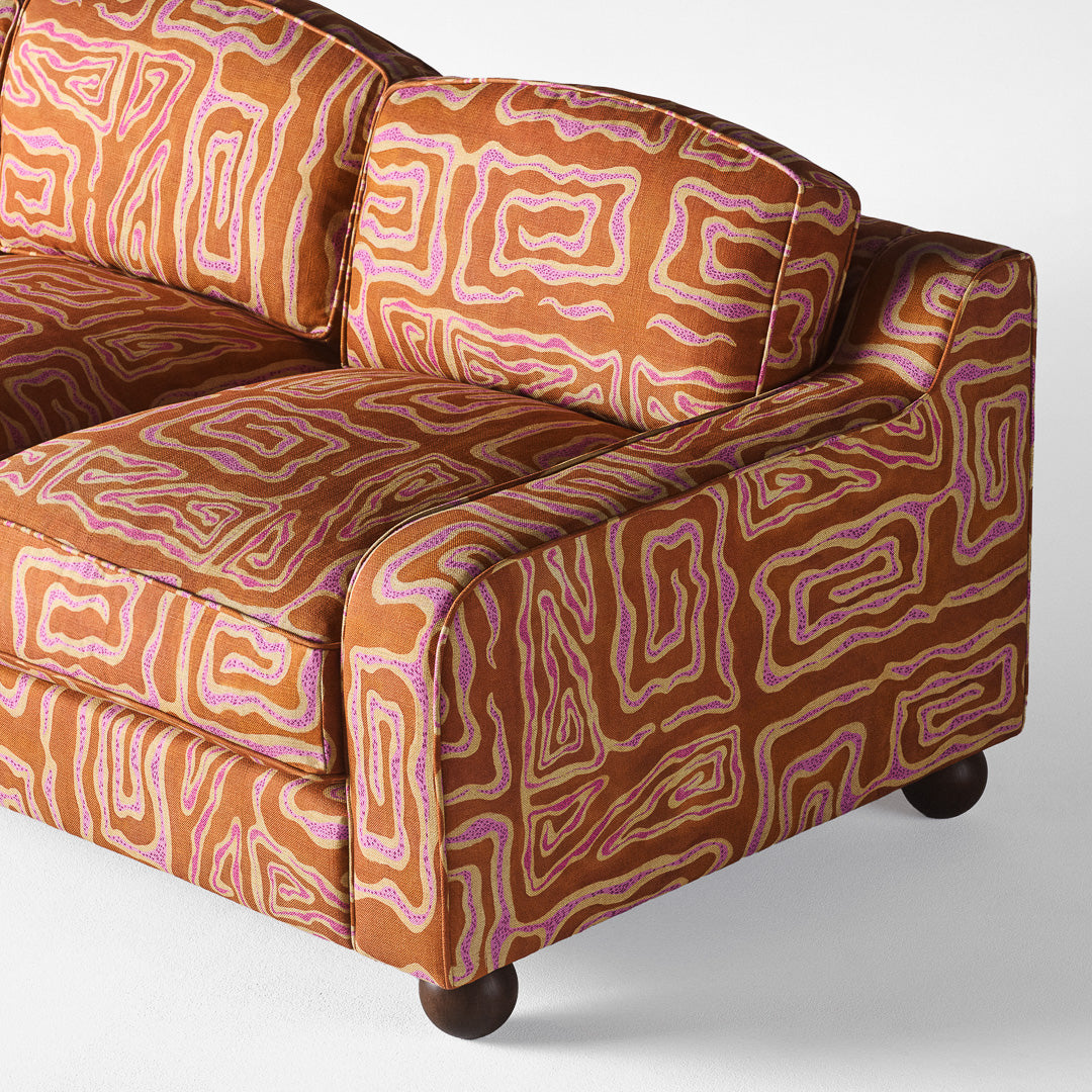 Sofa 3-Sitzer LOLA orange mit beige-rosafarbenem Muster