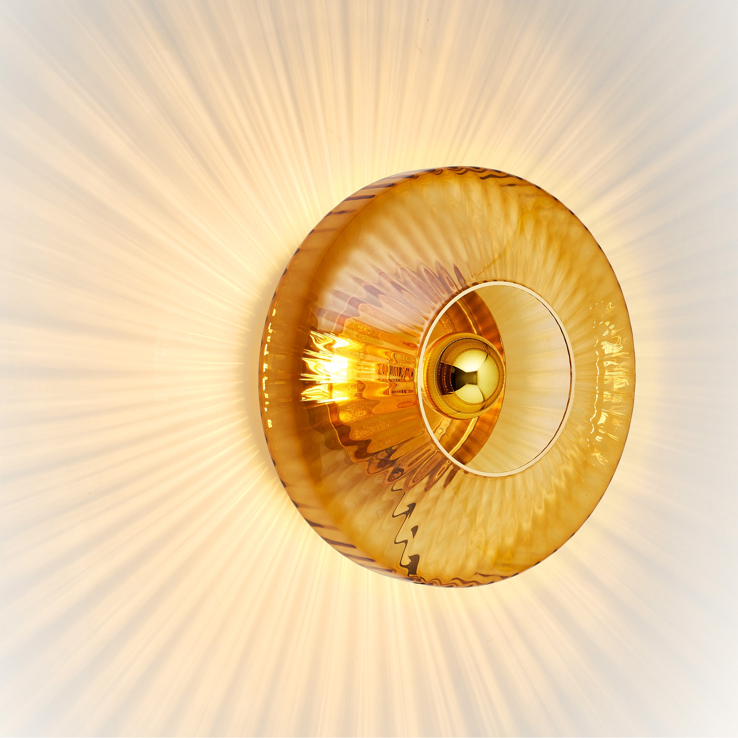 NEW WAVE OPTIC amber transparent wall lamp