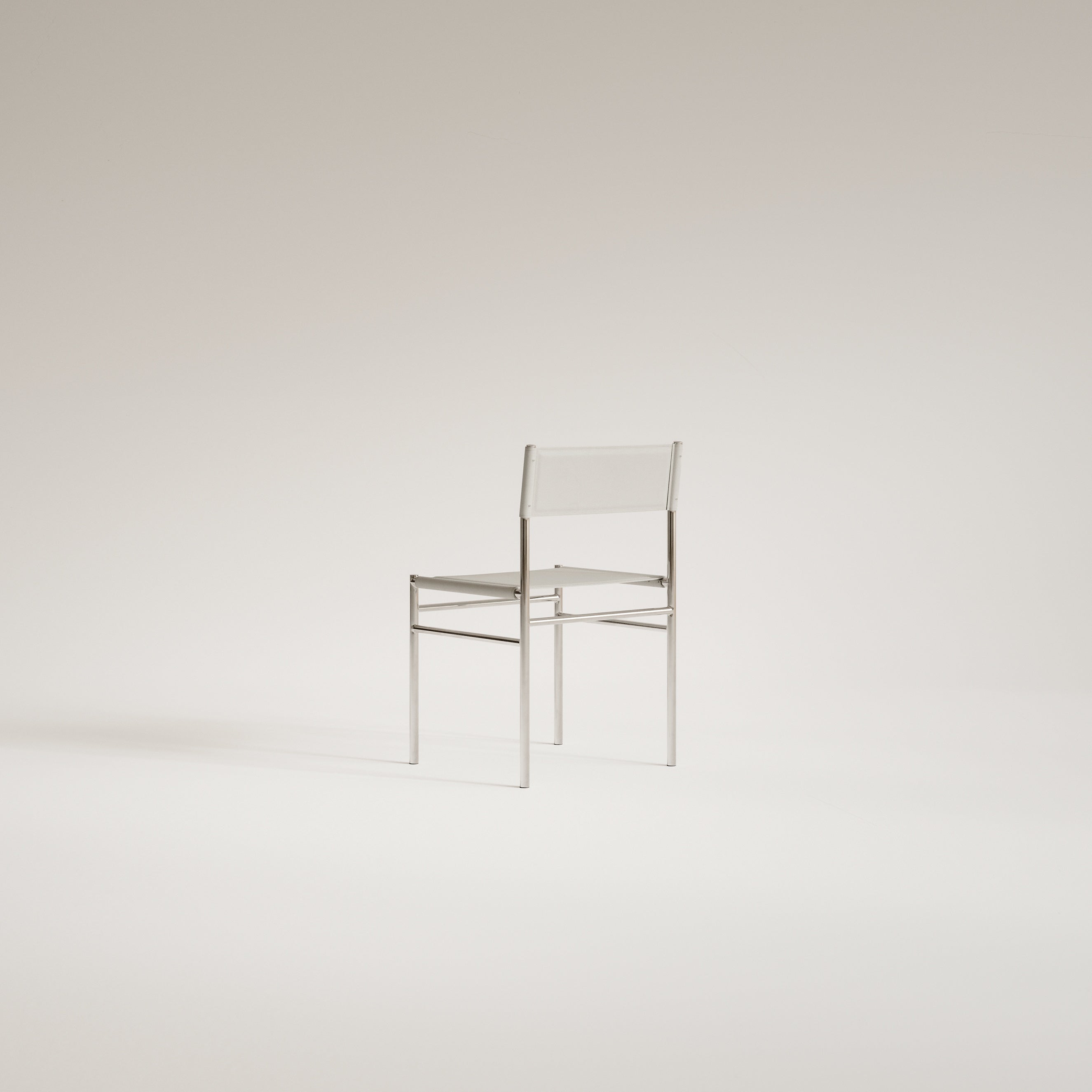 Stuhl FERRA aus Stahl und Leder