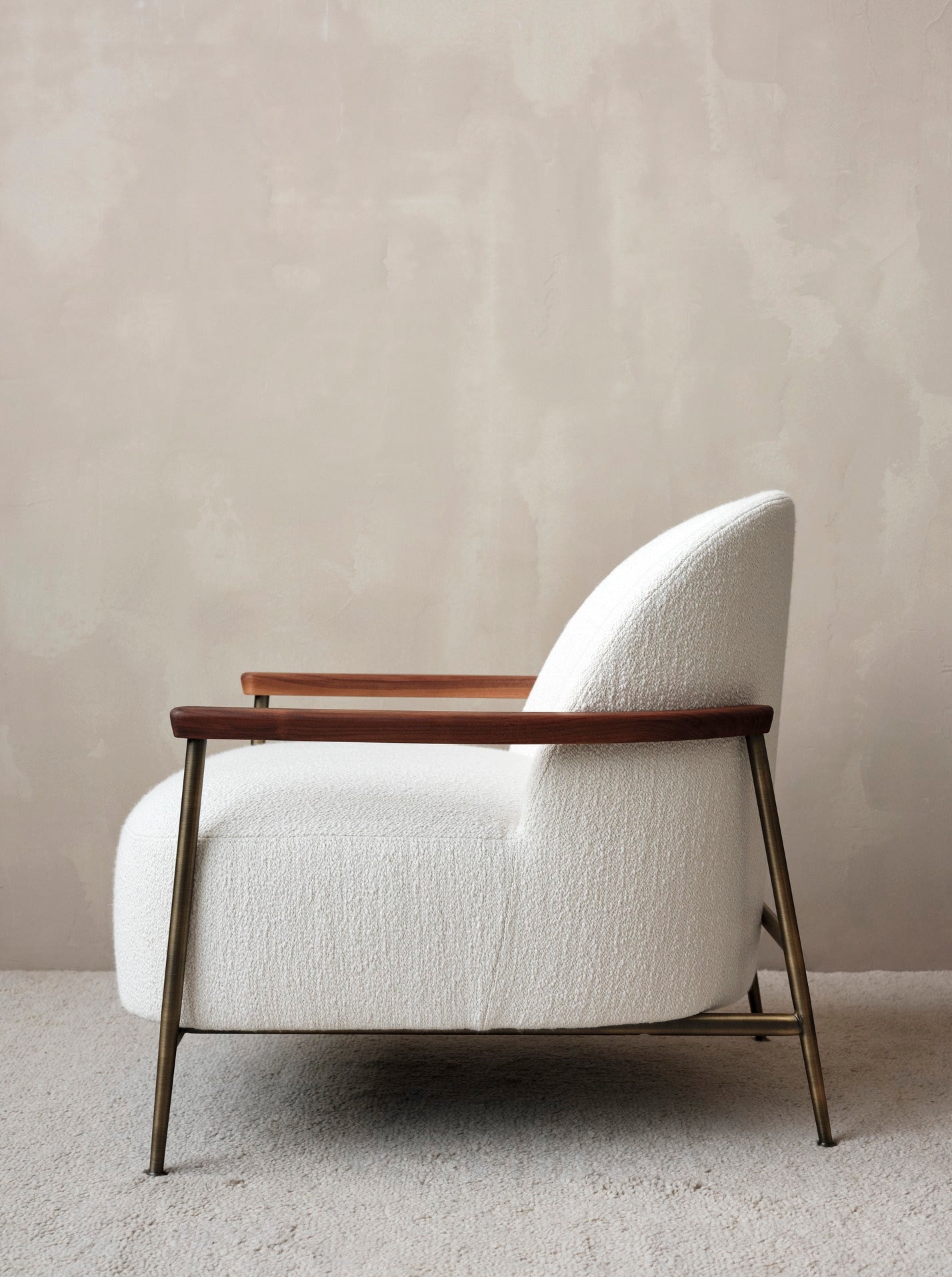 SEJOUR upholstered armchair with black base