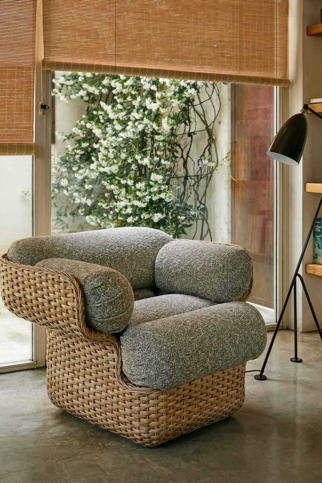 BASKET armchair in green with rattan