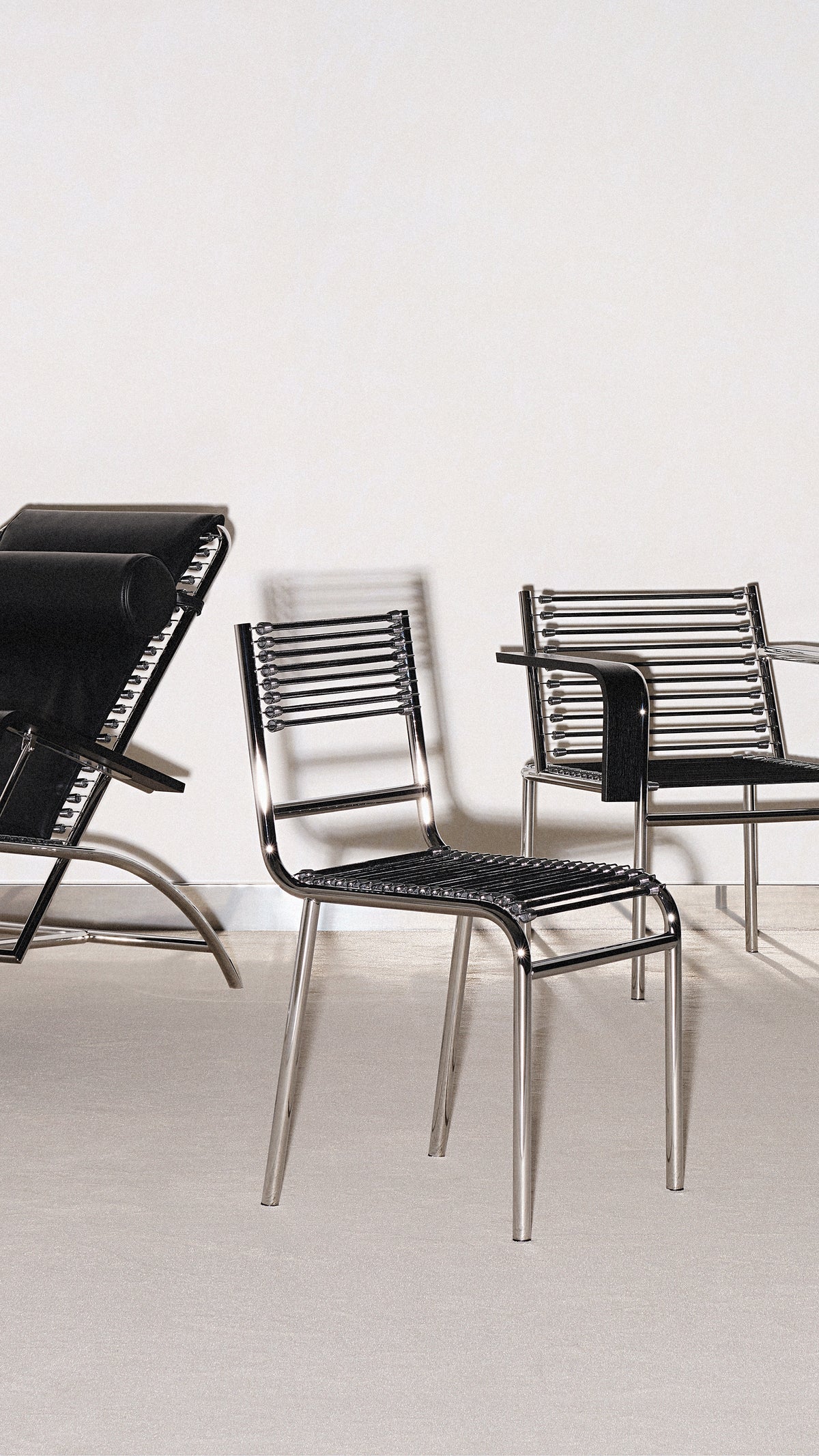 SANDOWS Sessel in Schwarz mit Stahlbasis