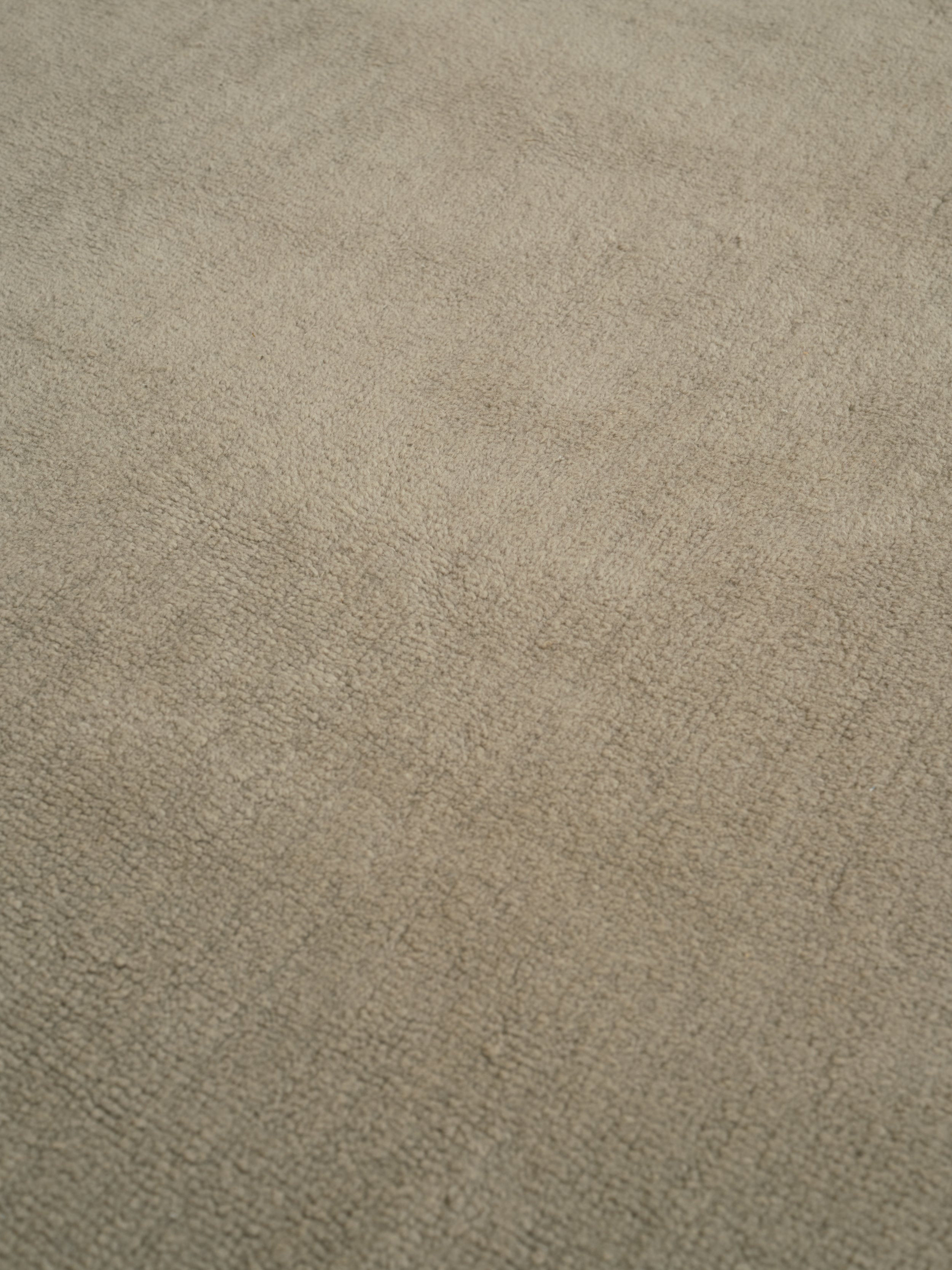 HUSHED FRAME rug in dark beige