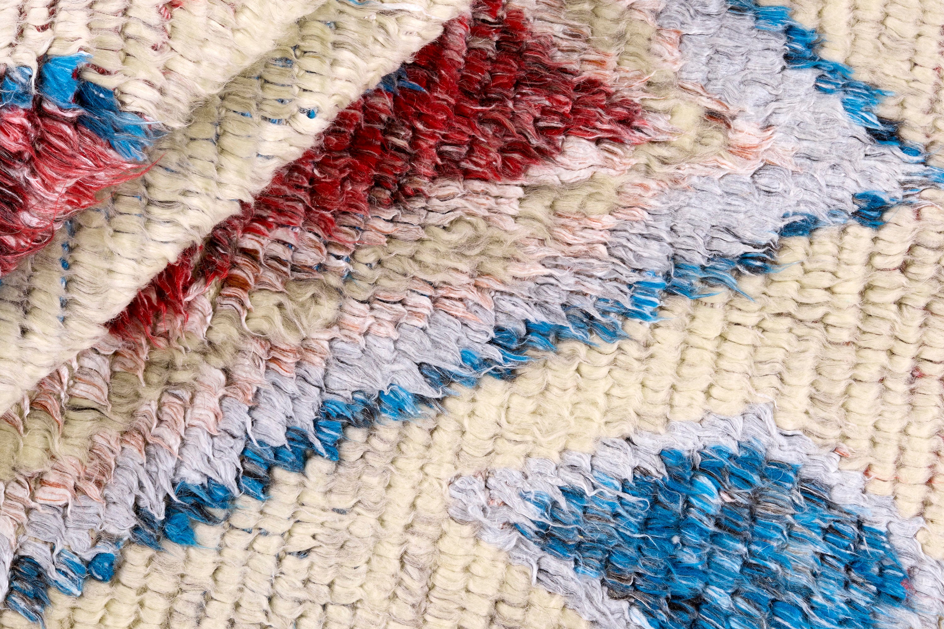 TRIBE beige rug with red and blue