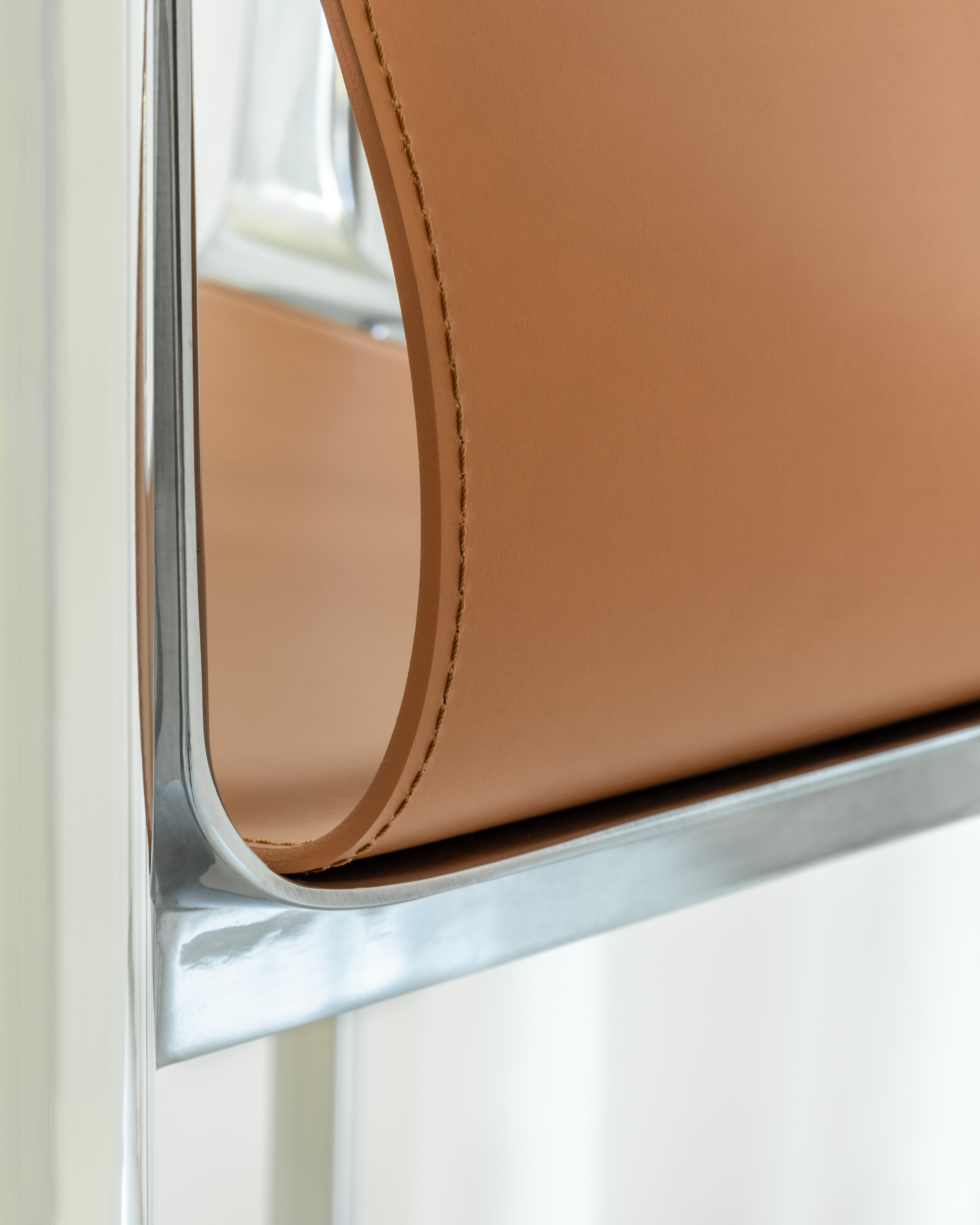 VENICE chair in cognac leather with a polished base