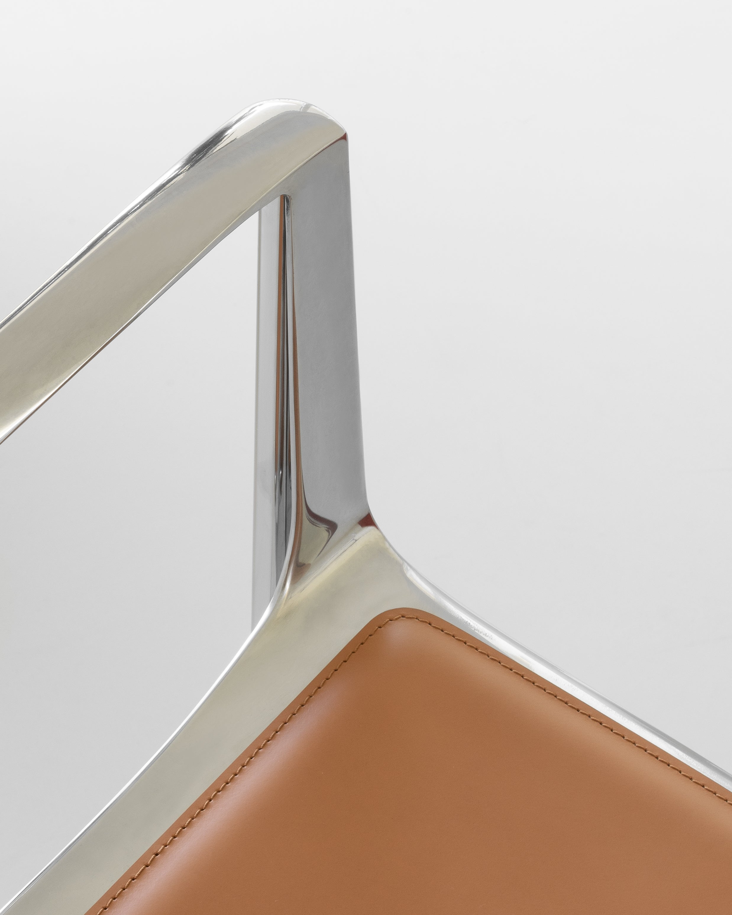 VENICE chair in cognac leather with a polished base