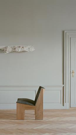 Tenon gepolsterte Sessel mit einer Eichenbasis