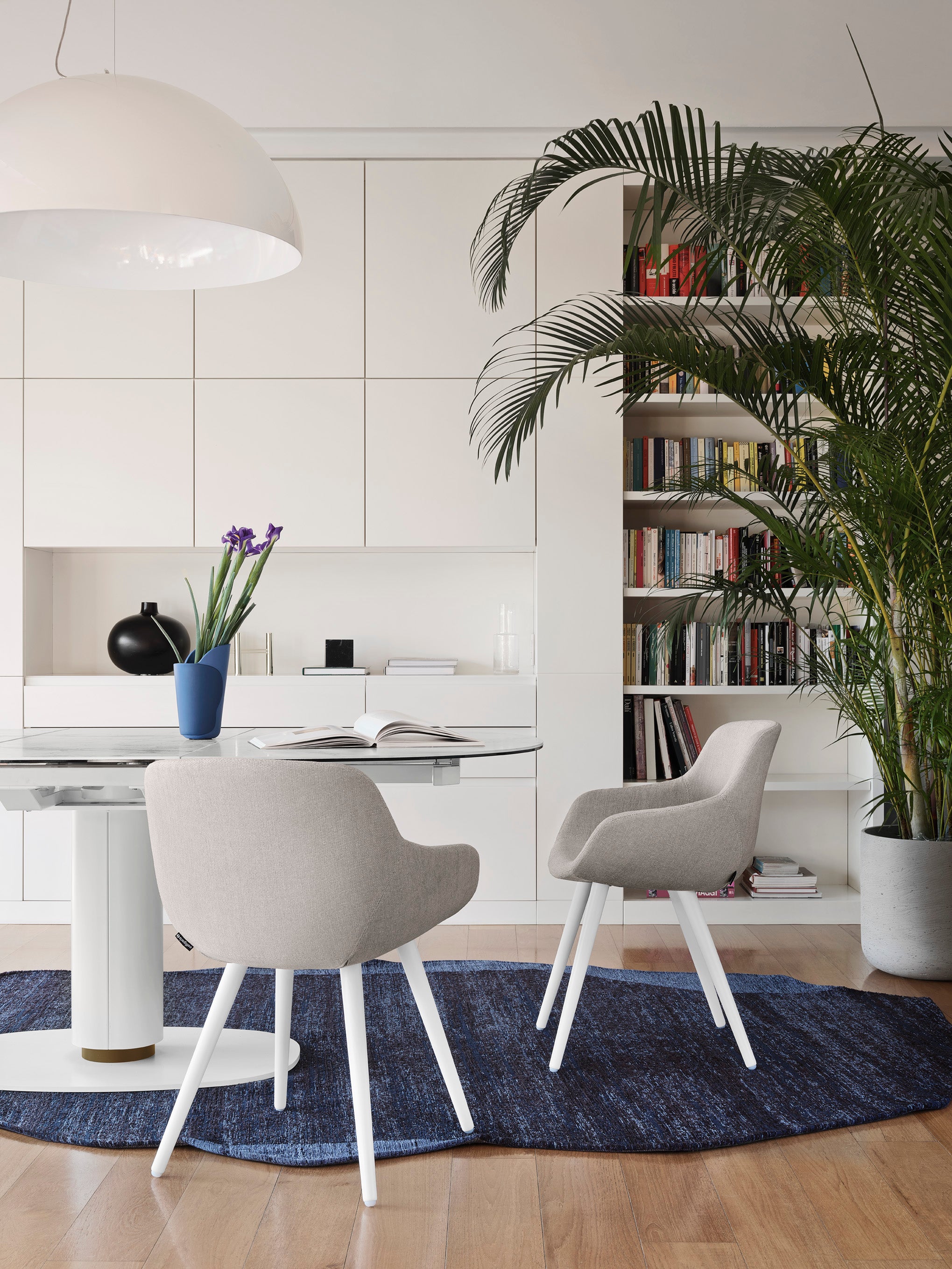 IGLOO upholstered chair with a dark wooden base