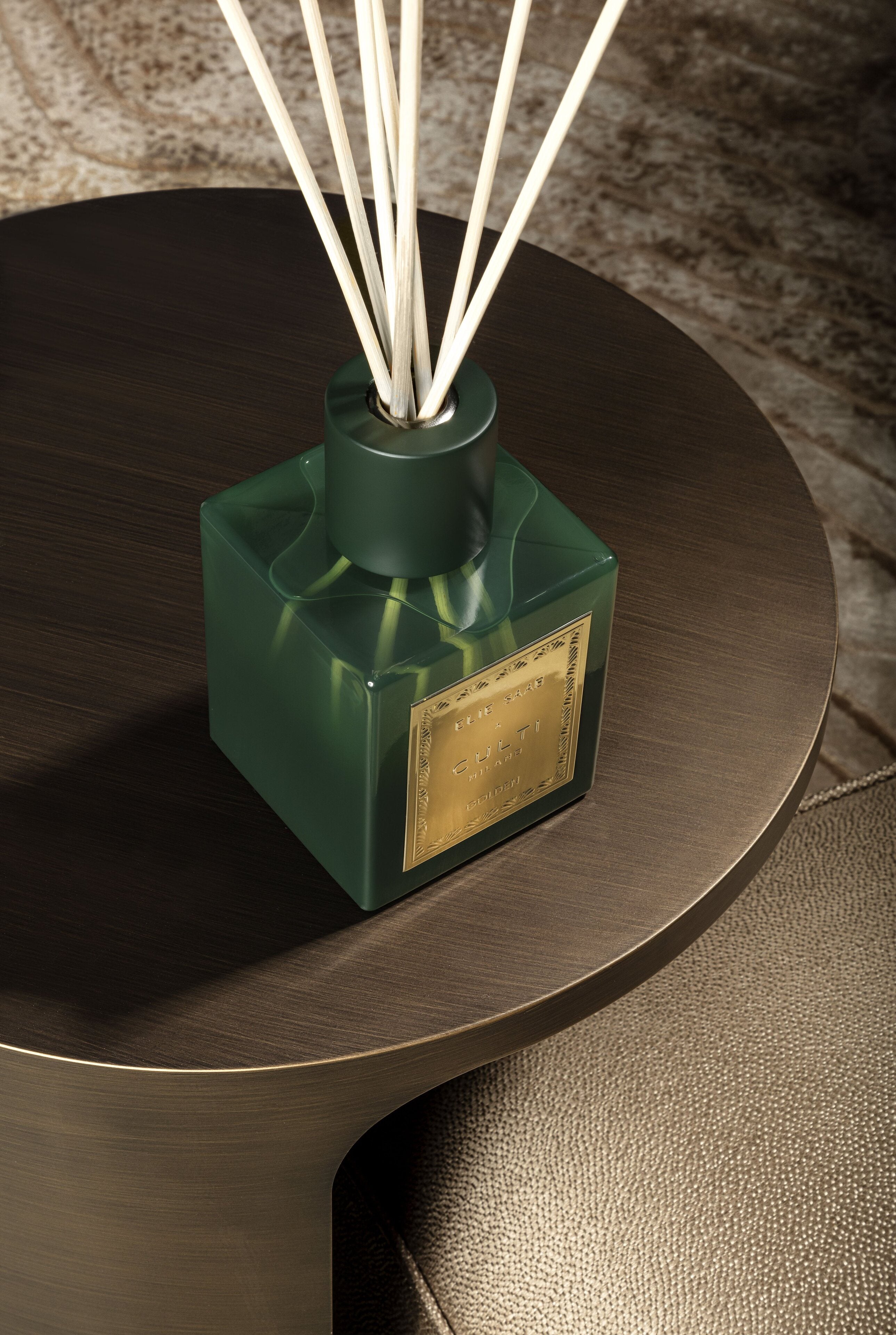 GOLDEN fragrance diffuser with notes of bitter orange, mandarin, ginger, orange blossom, and cedar.