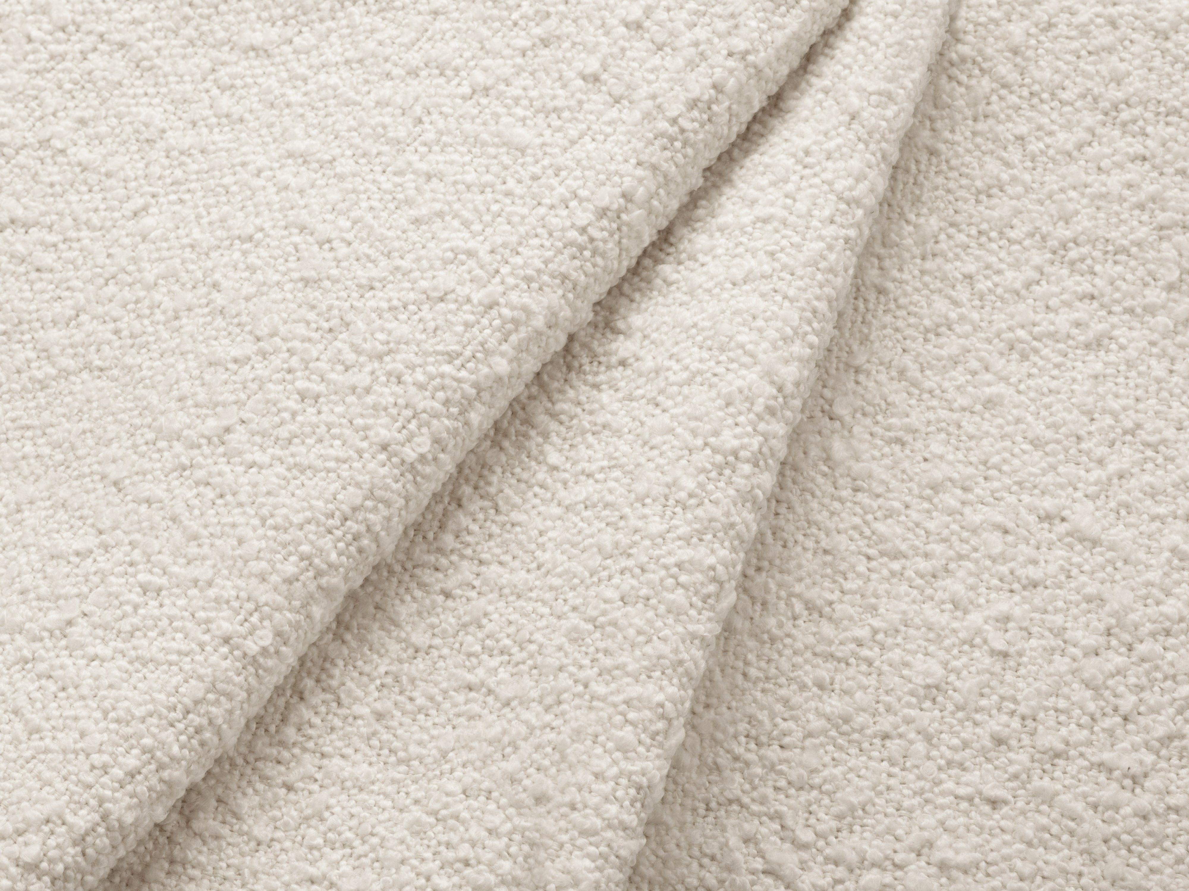 Narożnik prawostronny z funkcją spania KYOTO beżowy bouclé z czarną podstawą Cosmopolitan Design Eye on Design