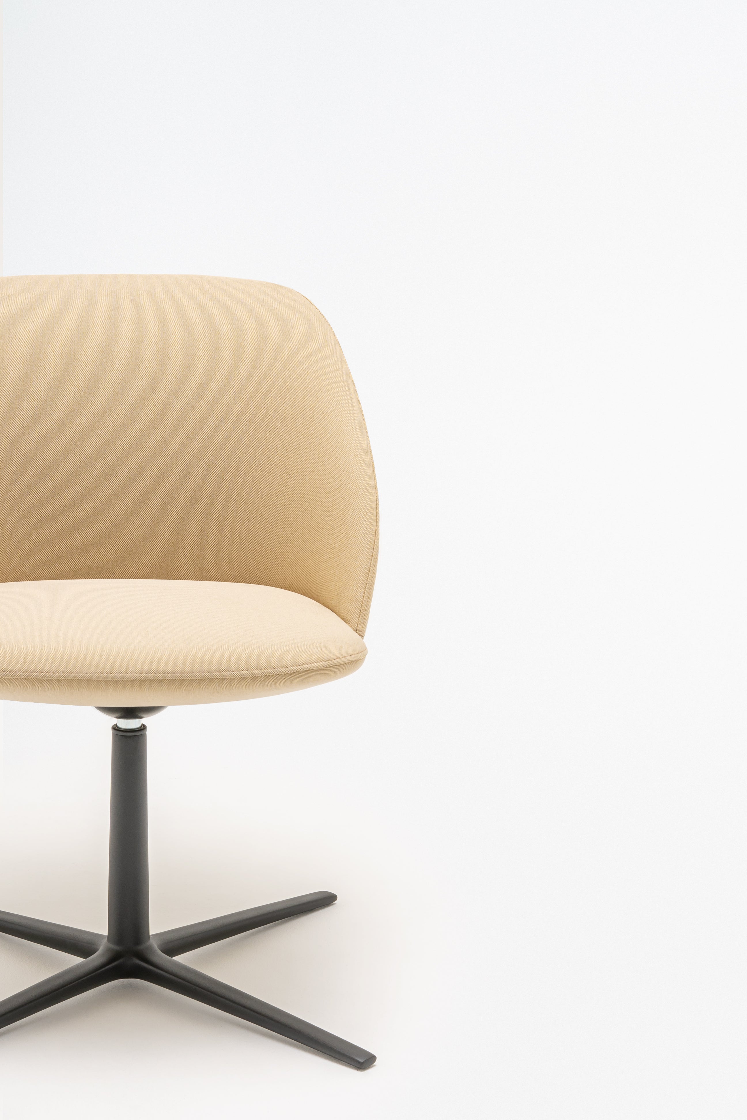 Armchair with low backrest.