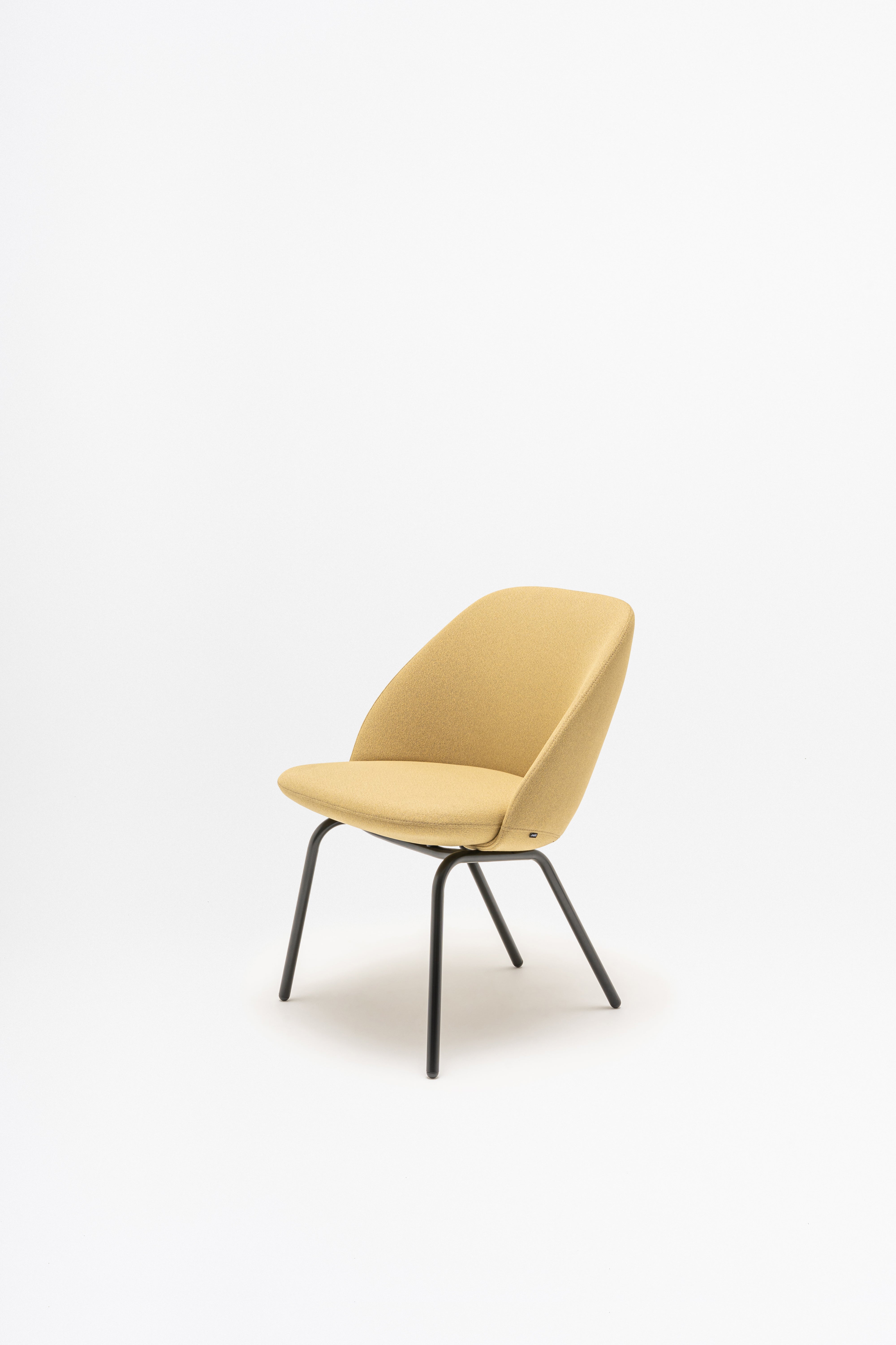 Armchair with low backrest parallel four -legged base