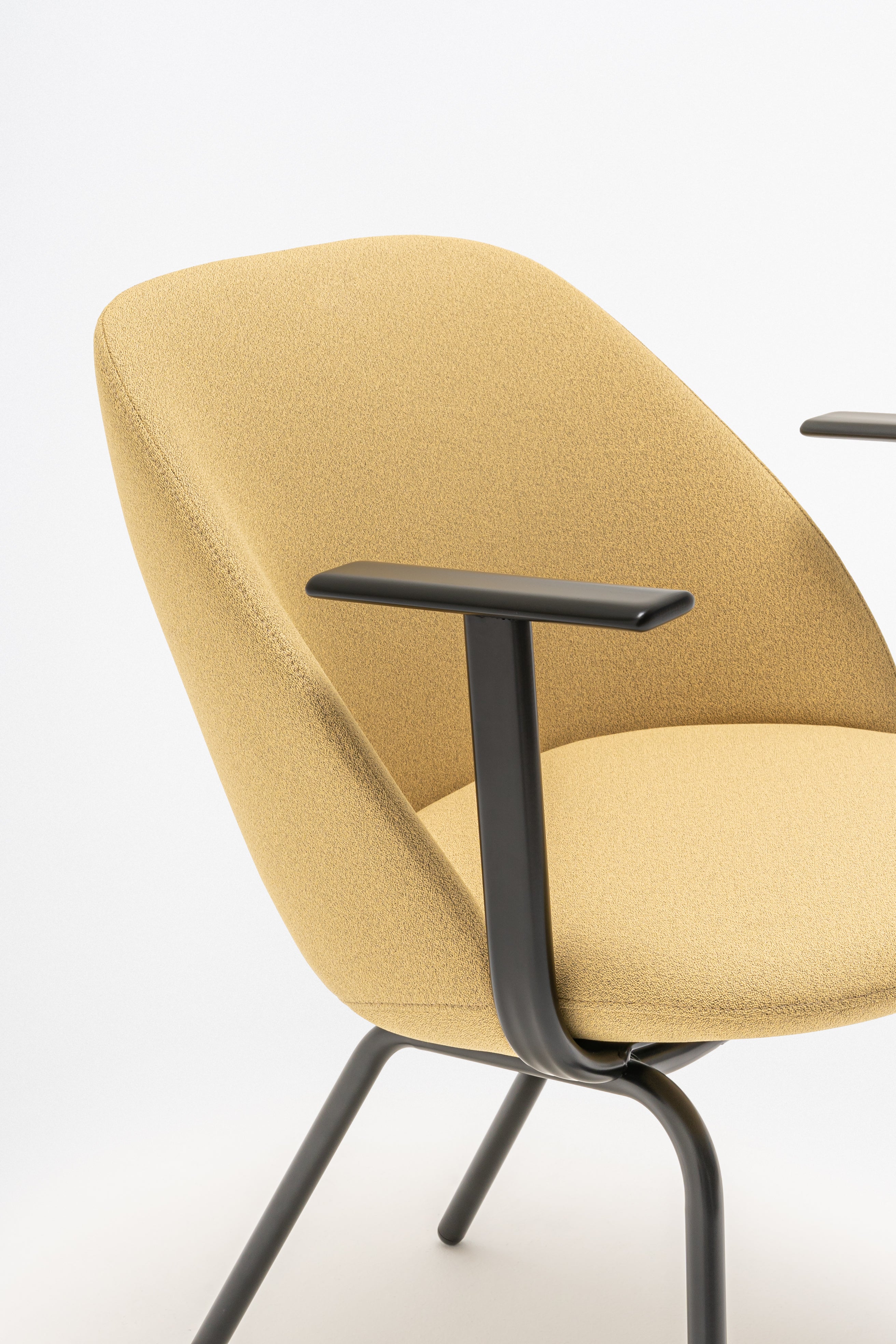 Armchair with low backrest parallel four -legged base