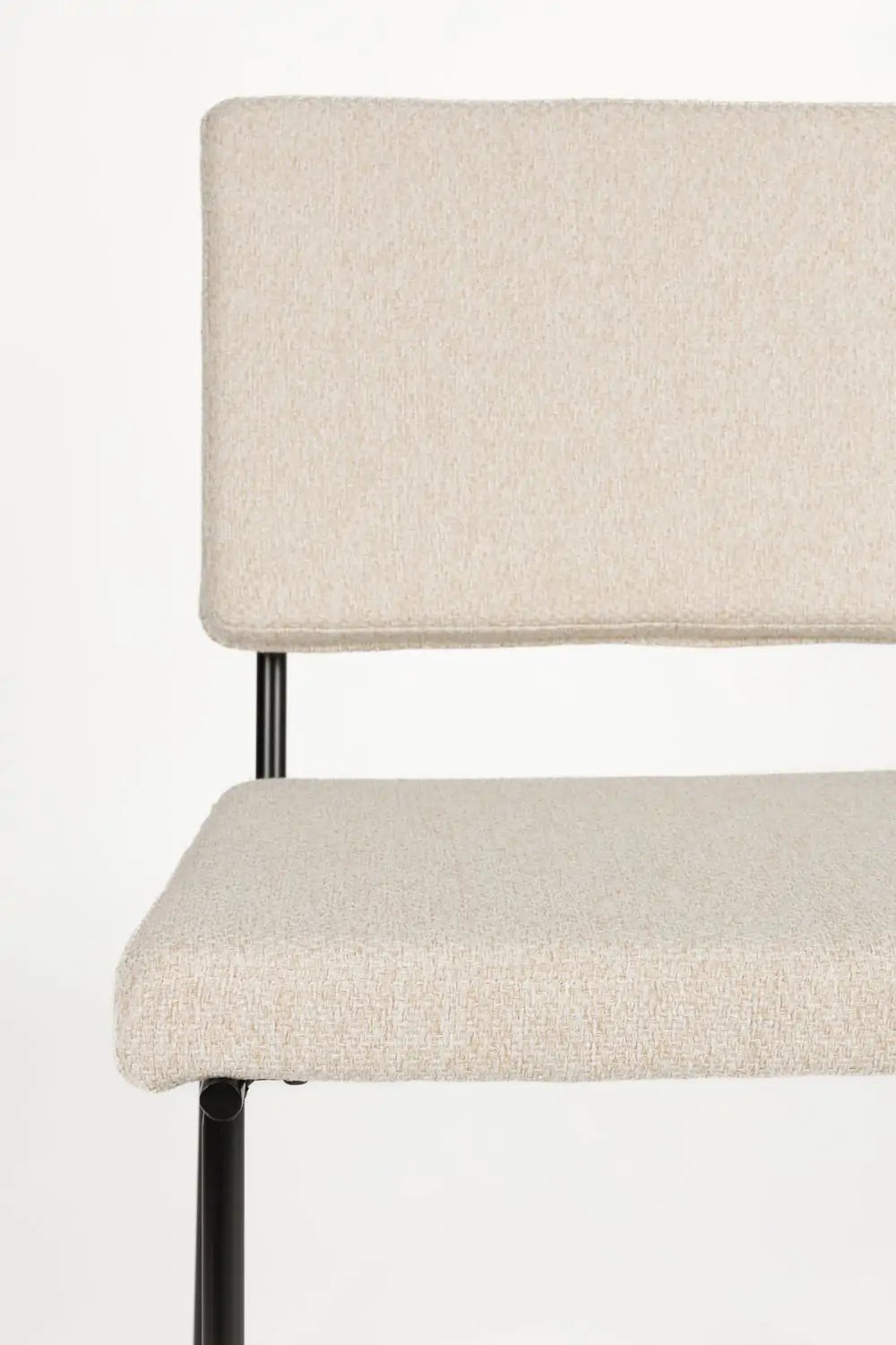 Fellow beige chair with a black base
