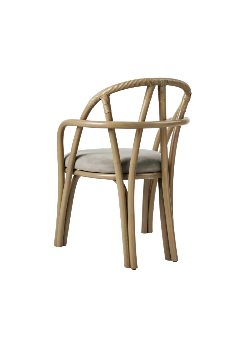 Upholstered BISTRA armchair with an olive rattan base
