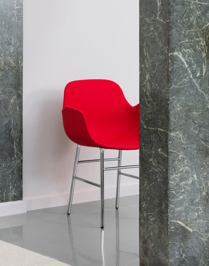 Chair with armrests red forms with a chrome base