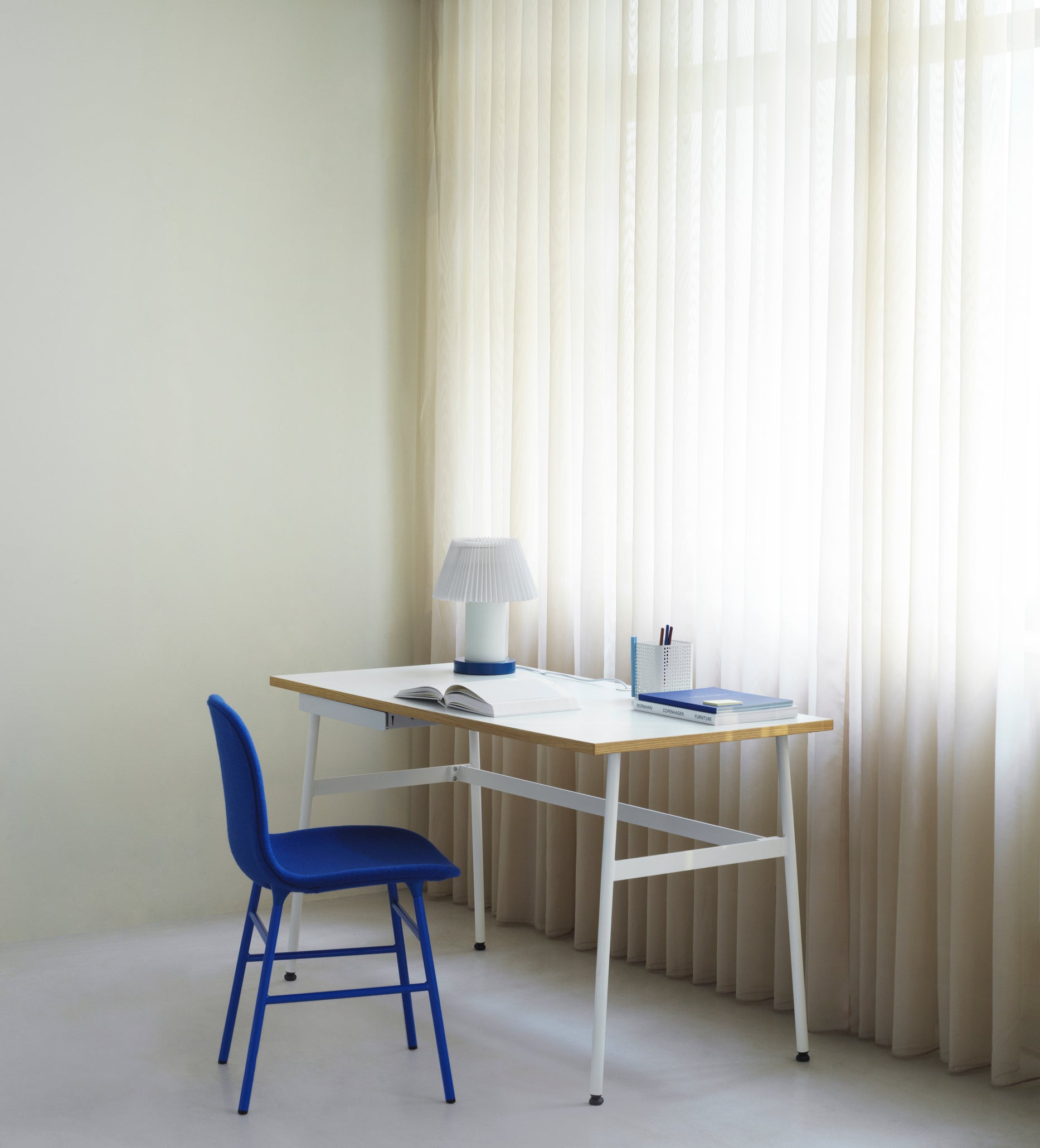 Upholstered chair with a gray base