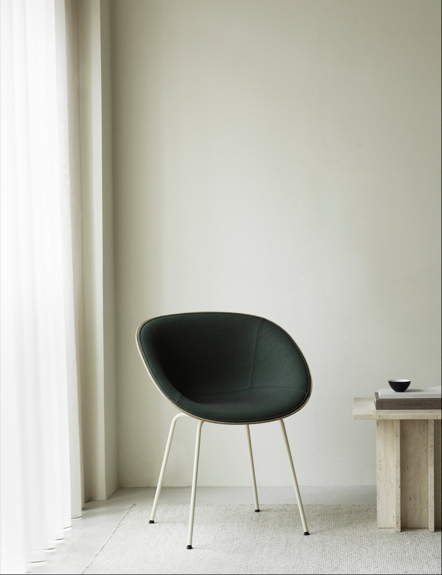 Upholstered chair Armchair beige with a black base