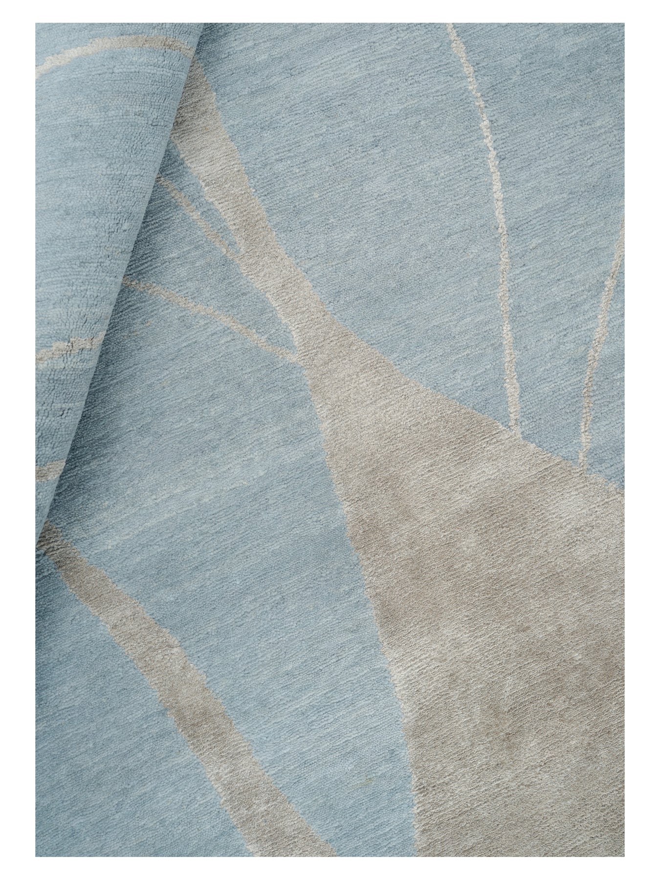 Asymmetrischer Teppich OYSTER TALE türkis