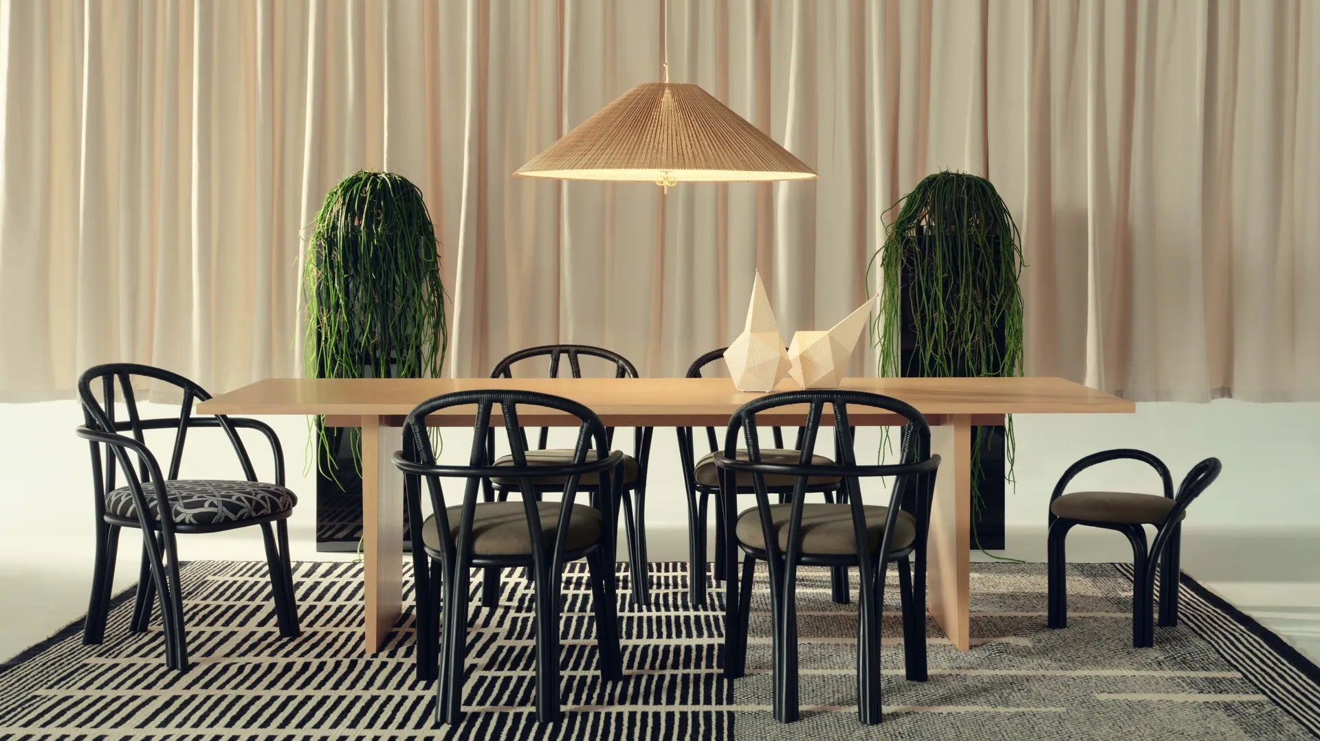 Upholstered BISTRA Chair with Rattan Ebony Base