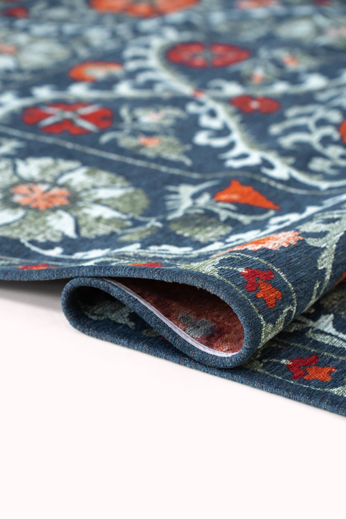 Teppich SUZANI NORDIC blau mit grau und orange