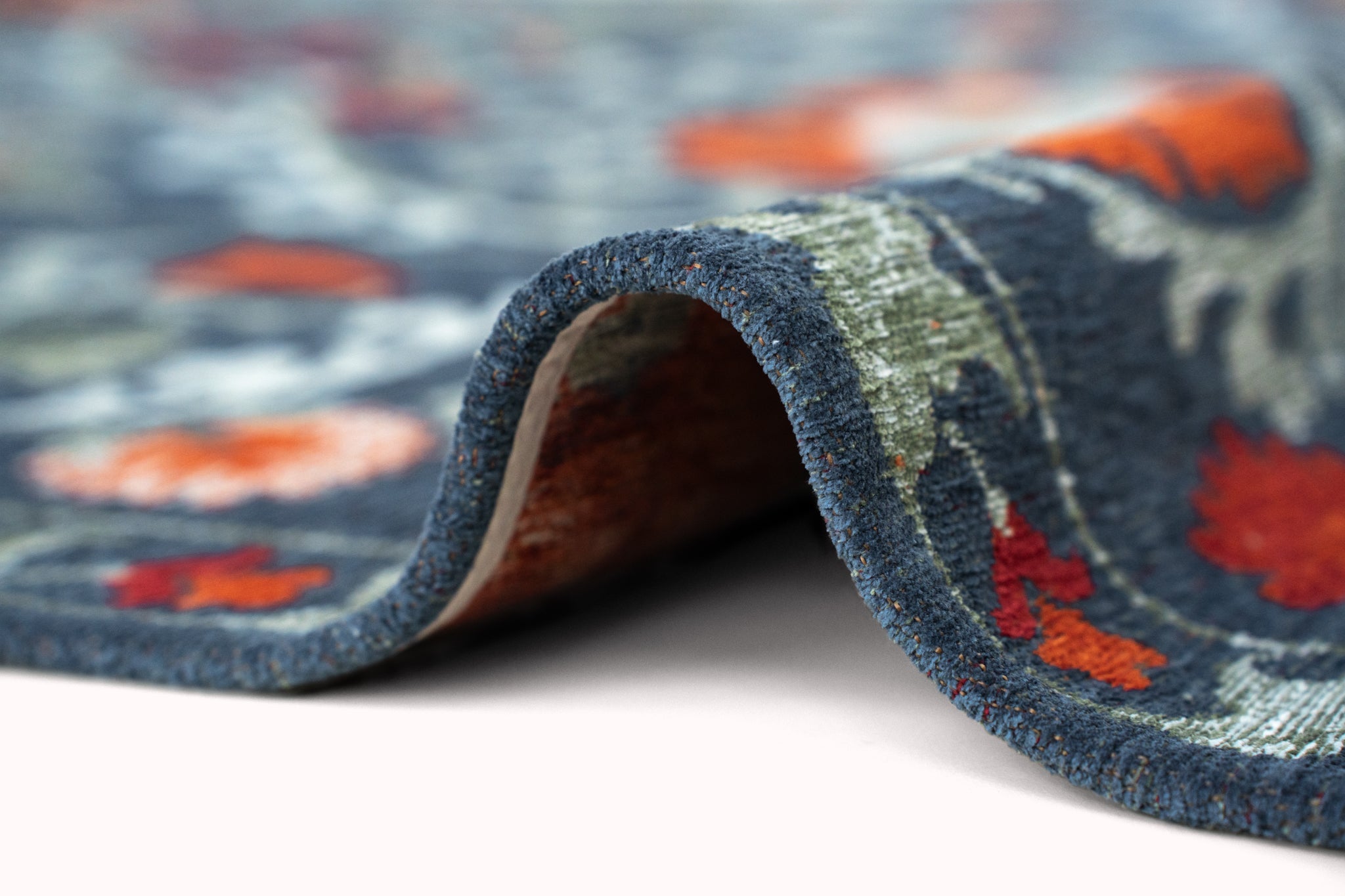 Teppich SUZANI NORDIC blau mit grau und orange