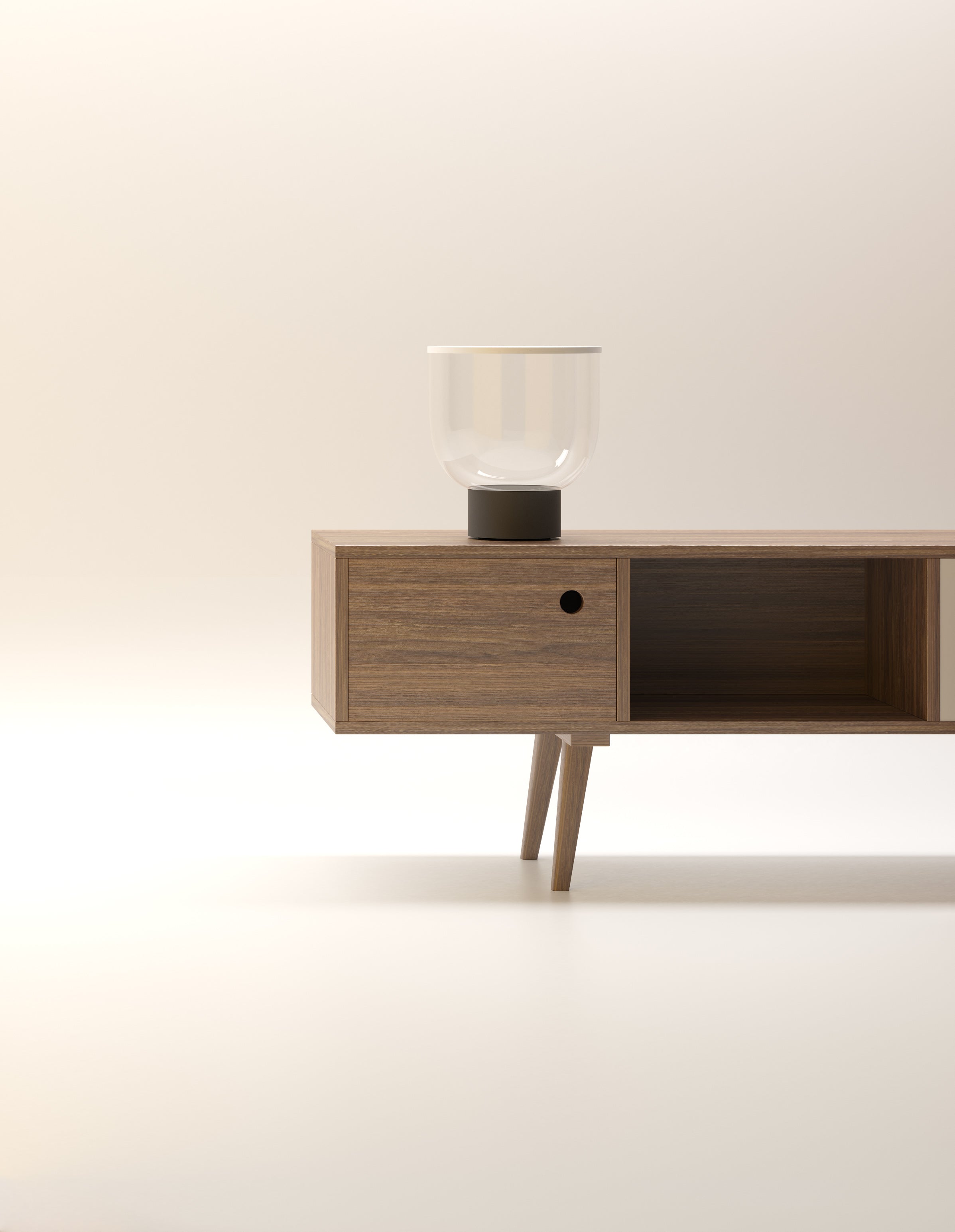 GRAMMOLUCE table lamp with a glass shade and black base.