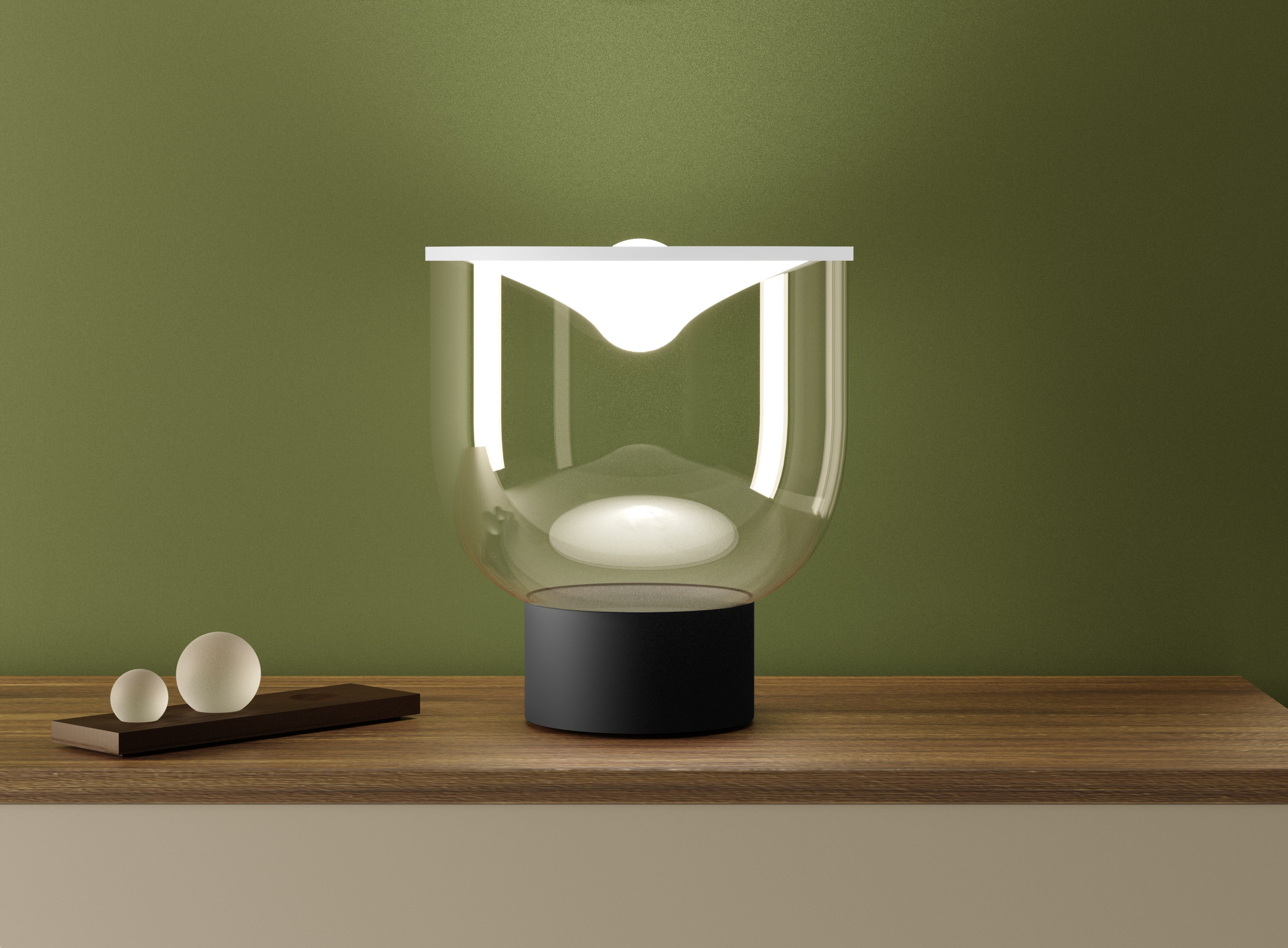 GRAMMOLUCE table lamp with a glass shade and black base.