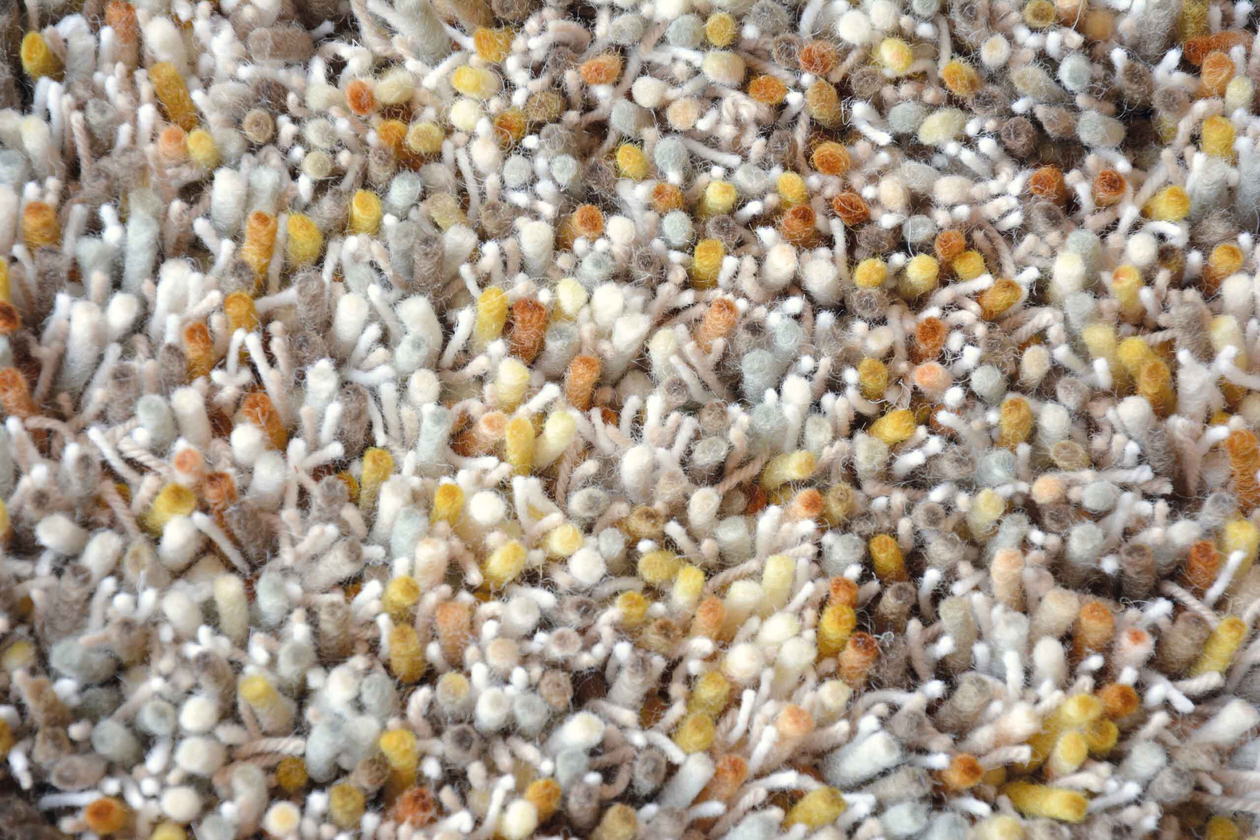 YOUNG cream-orange rug with long pile