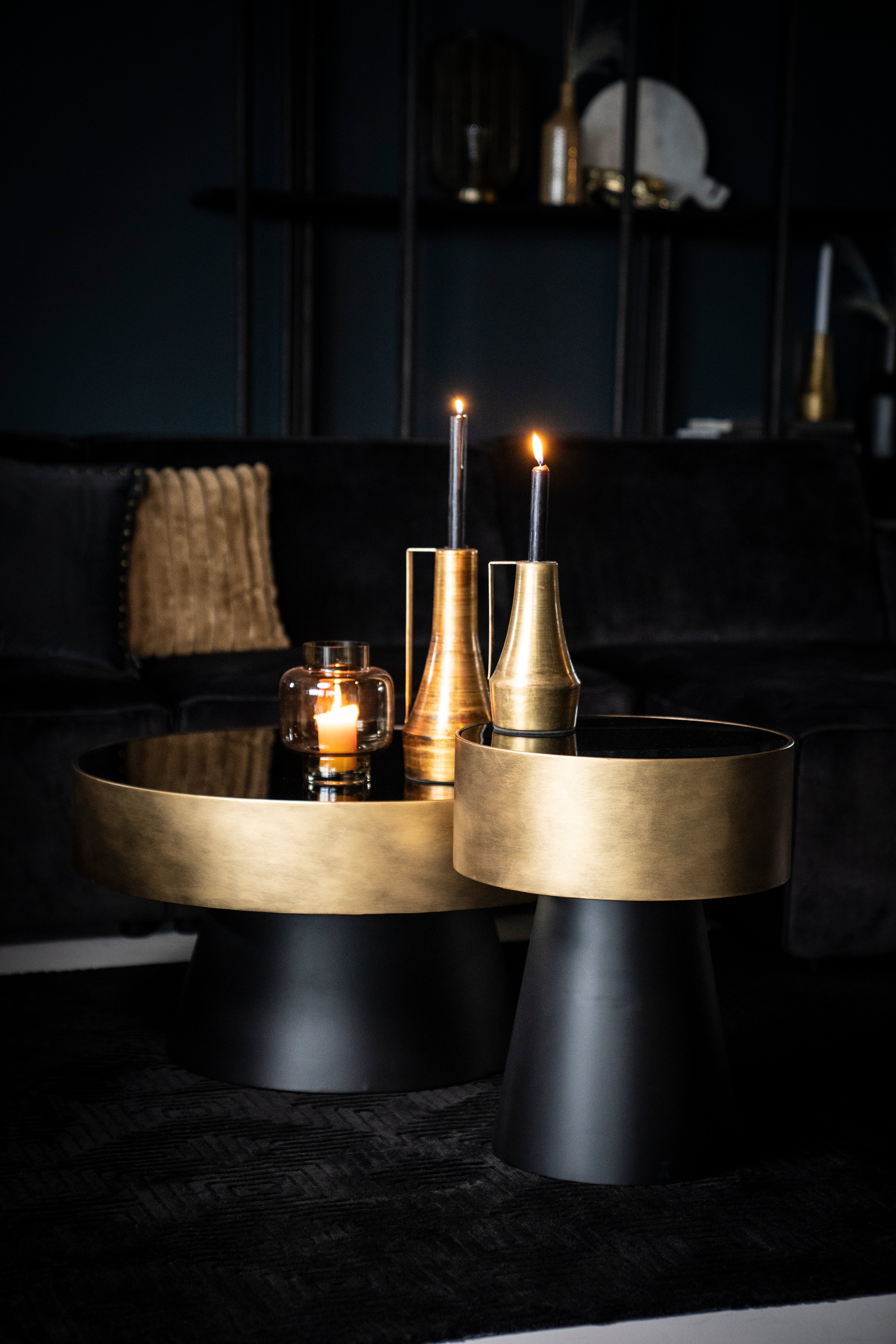 BUNGA coffee table in gold with a black base