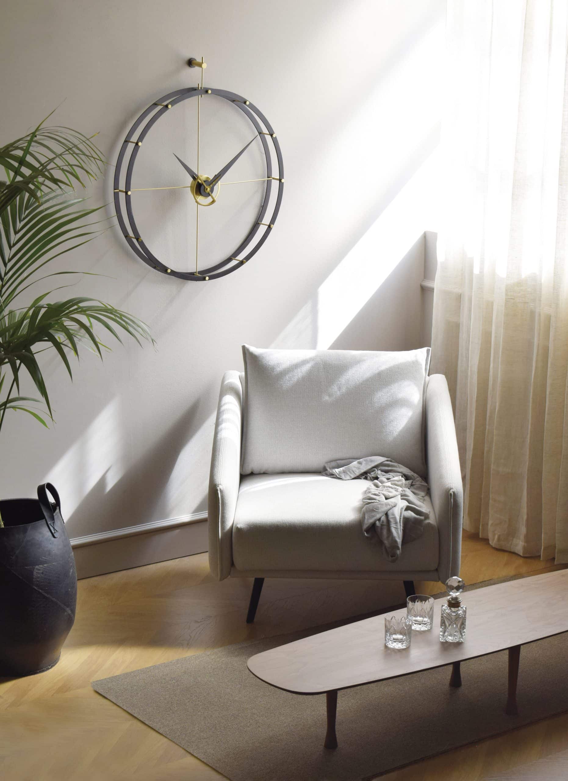 DOUBLE O black wall clock with brass