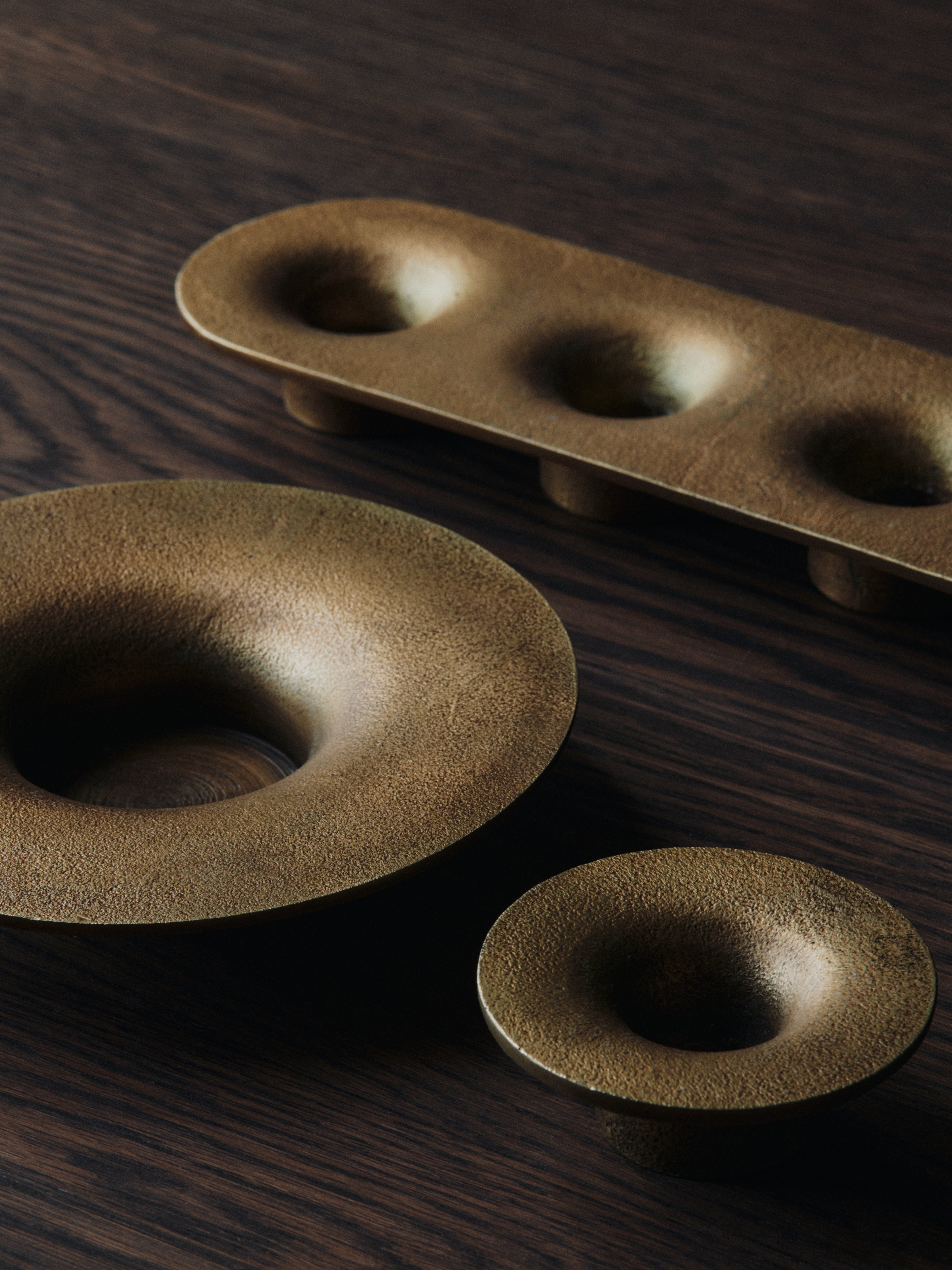 SOOTHE Candle Holder with a Brass Finish