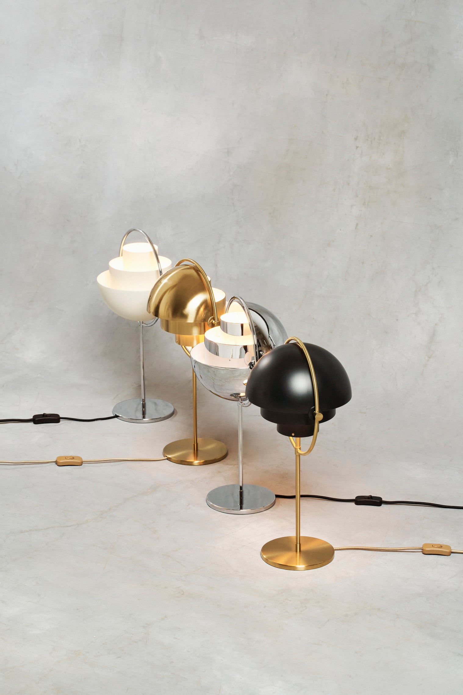 MULTI-LITE table lamp with a chrome base and white shade