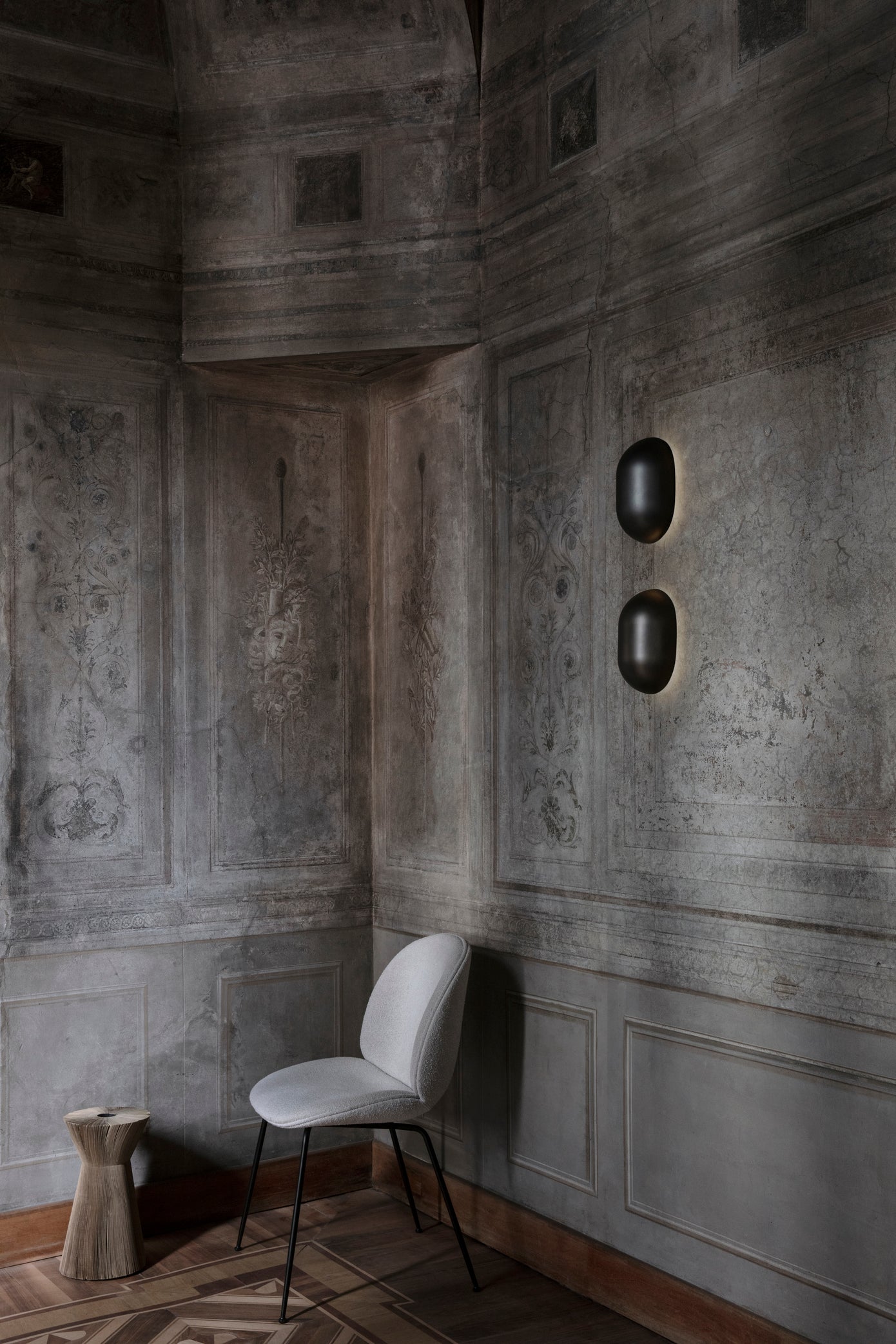 BEETLE upholstered chair with a black base